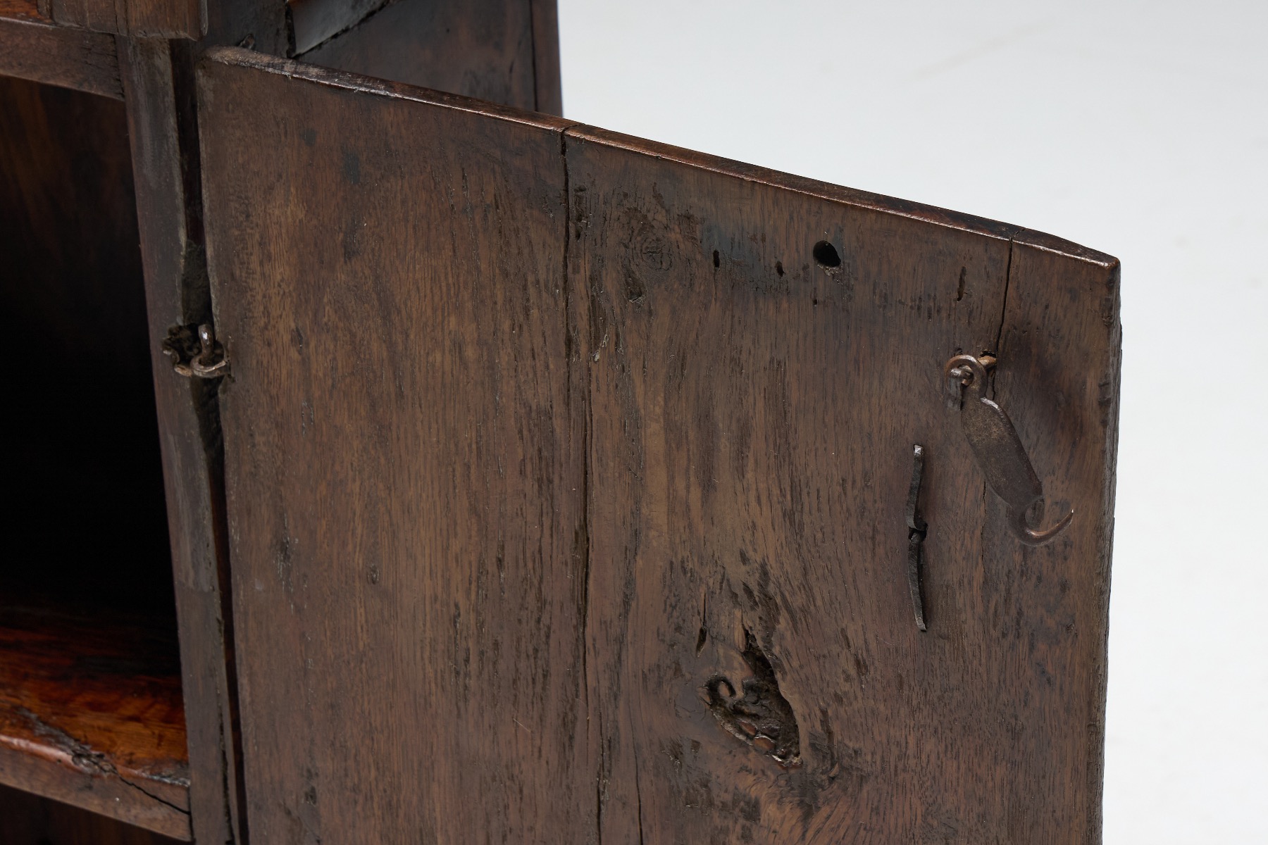 Timeworn art populaire cabinet with folk character