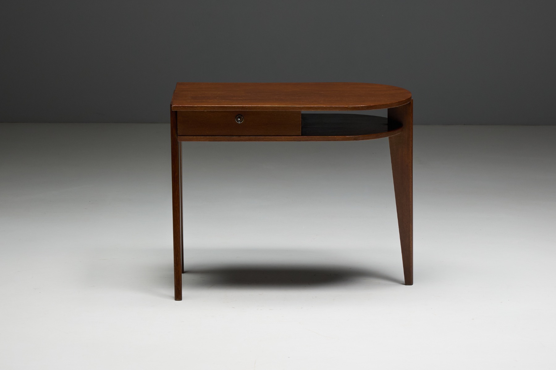Tripod desk with integrated drawer designed by Jacques Adnet
