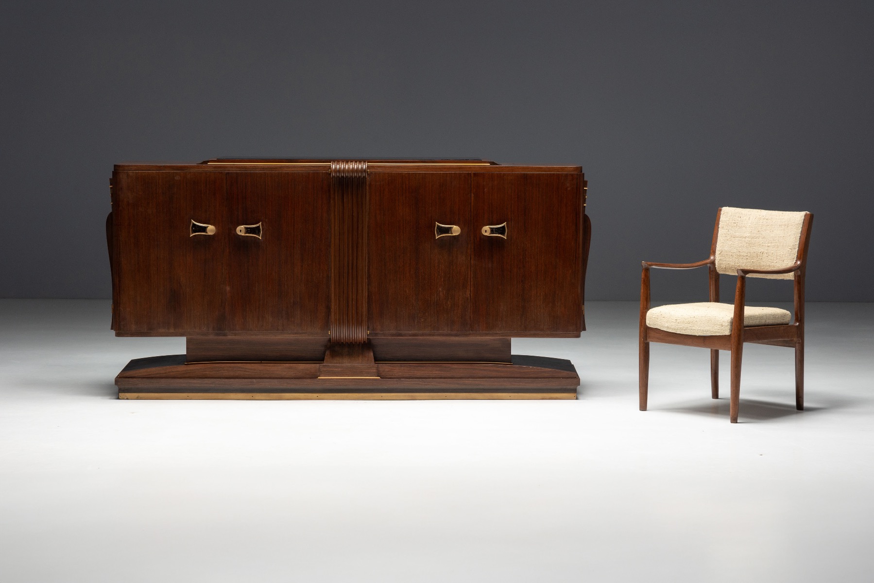 Walnut Art Deco sideboard accented with brass trim