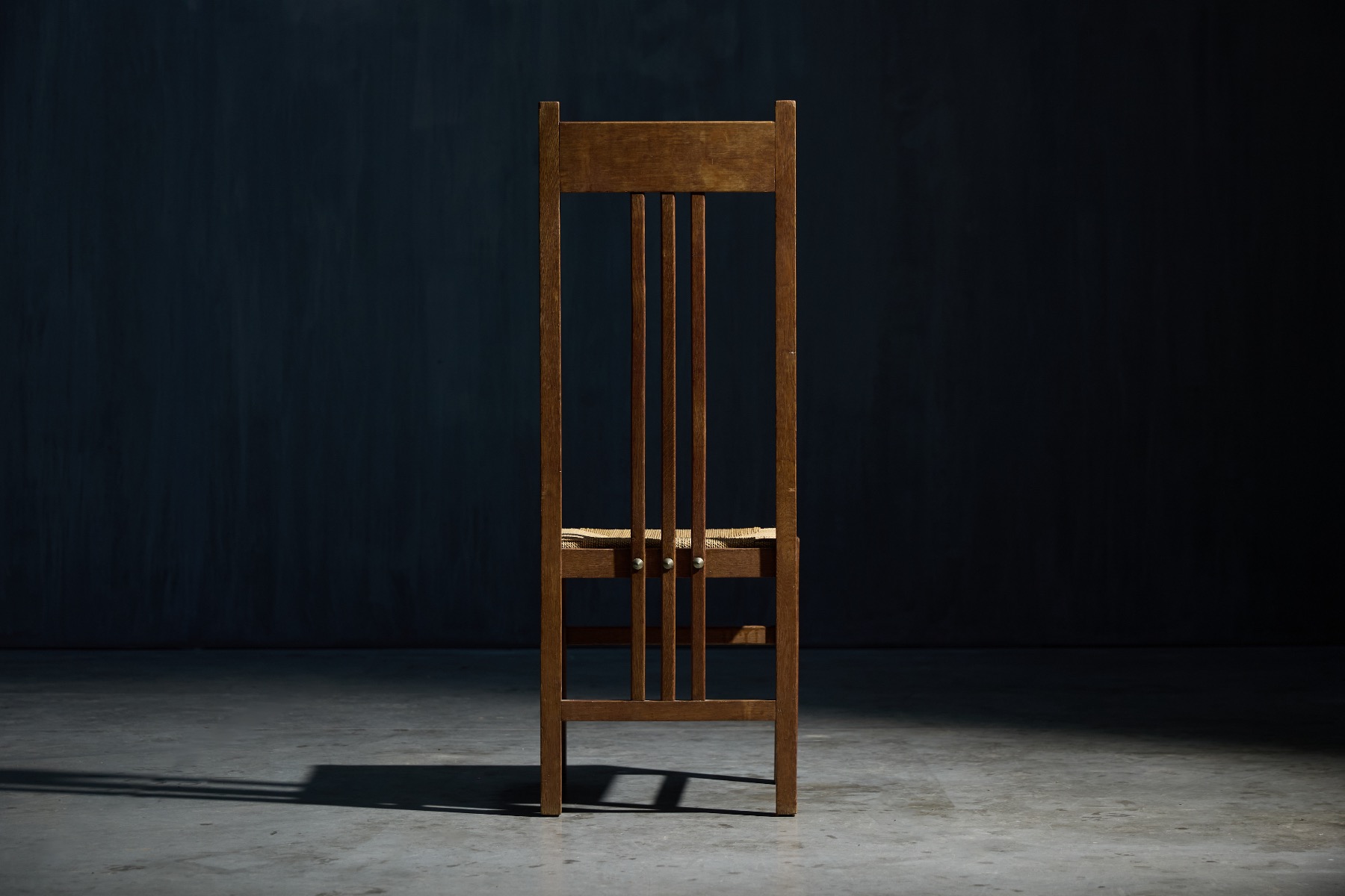 Refined Dutch modernist chairs with tall silhouette