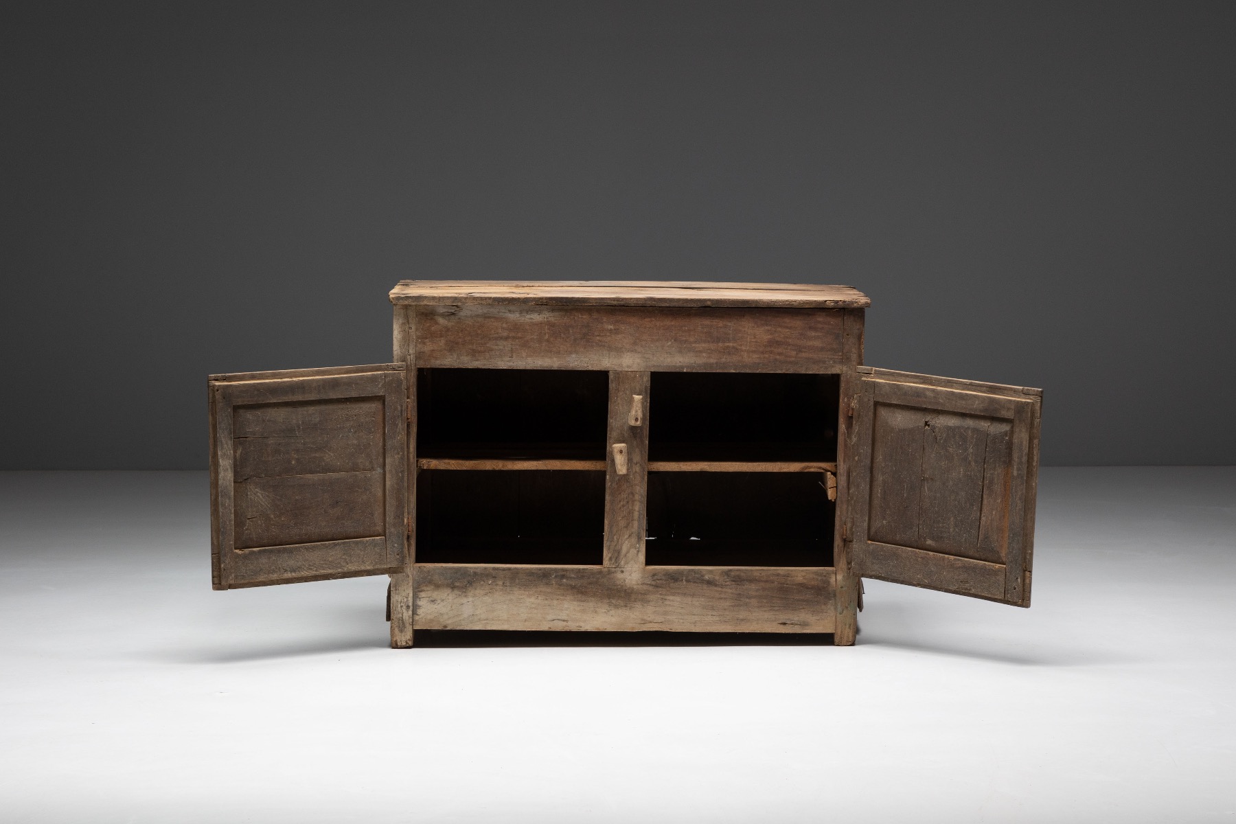 Aged wood wabi sabi cabinet with vernacular design