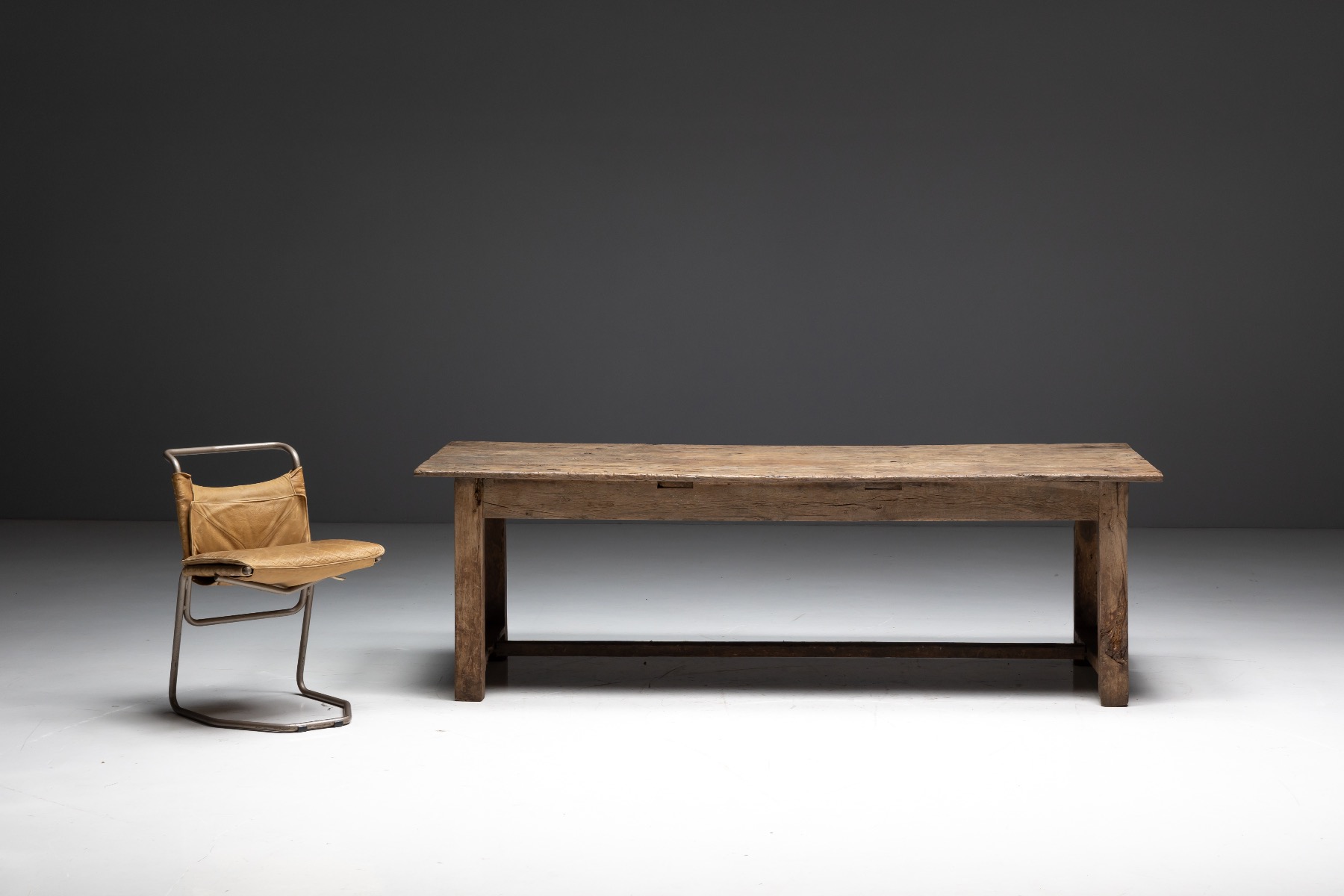 Collectible rustic farmhouse dining table in antique wood