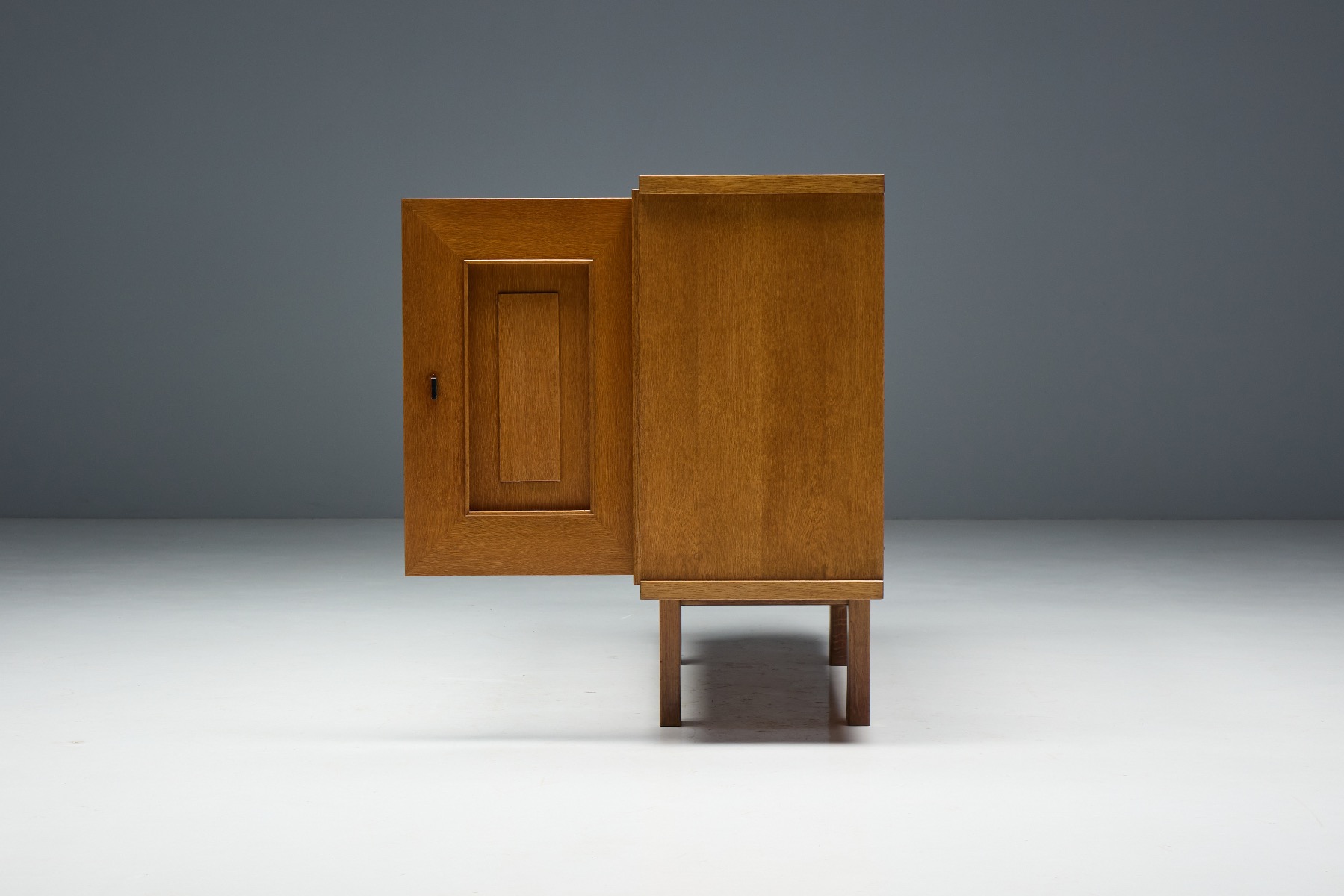 Gallery level brutalist oak cabinet with sculptural weight