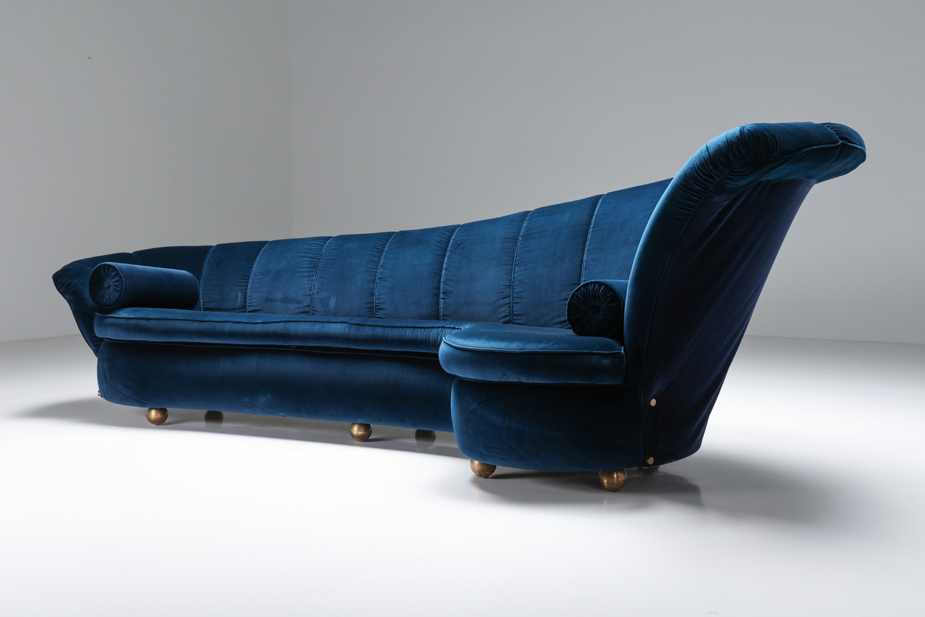 Retro glam curved velvet sofa with flowing lines