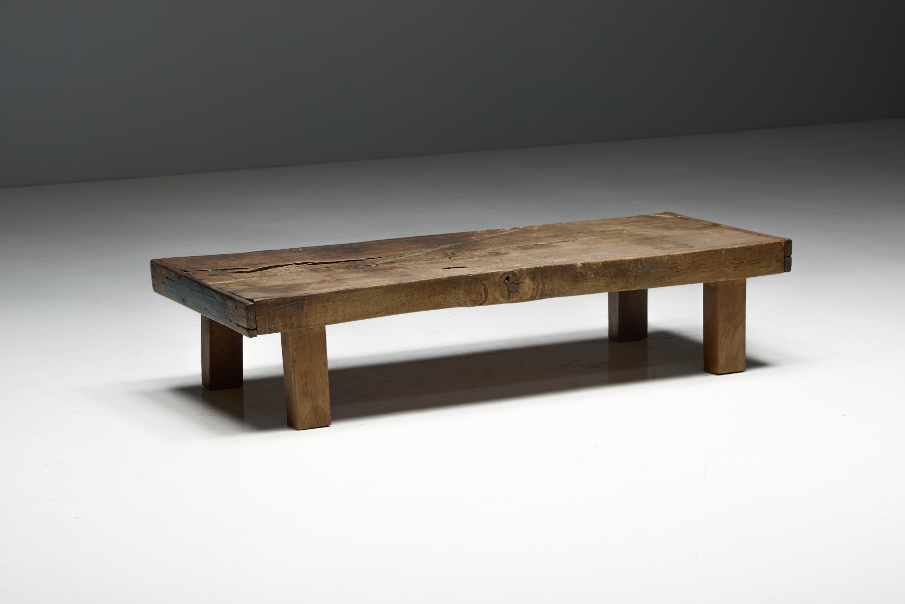 Traditional low farmhouse coffee table with utilitarian design