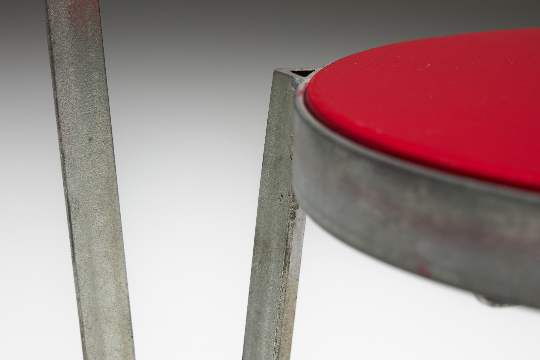 Aged metal industrial chair from the 1940s design