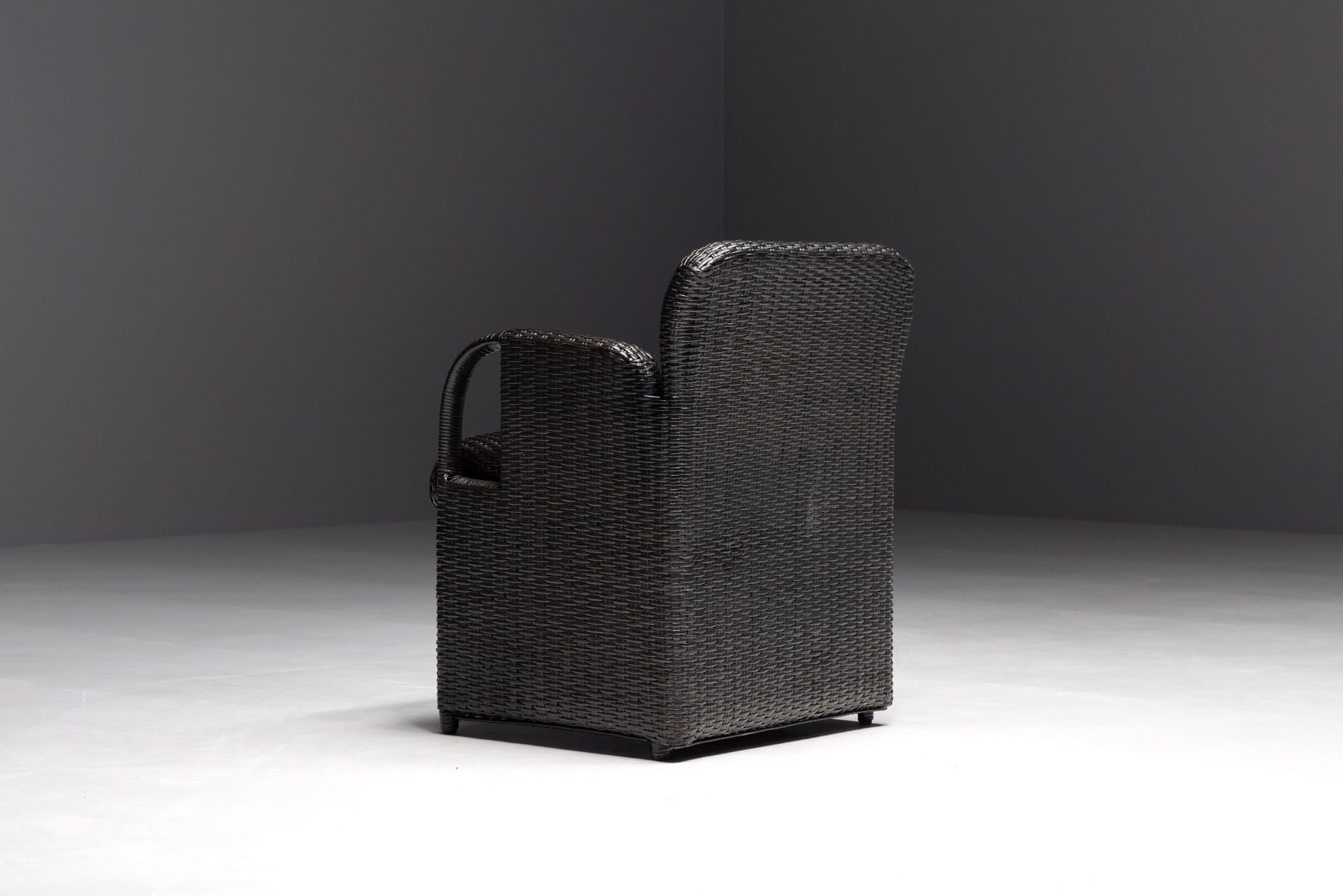 Designer lounge armchairs by Gae Aulenti