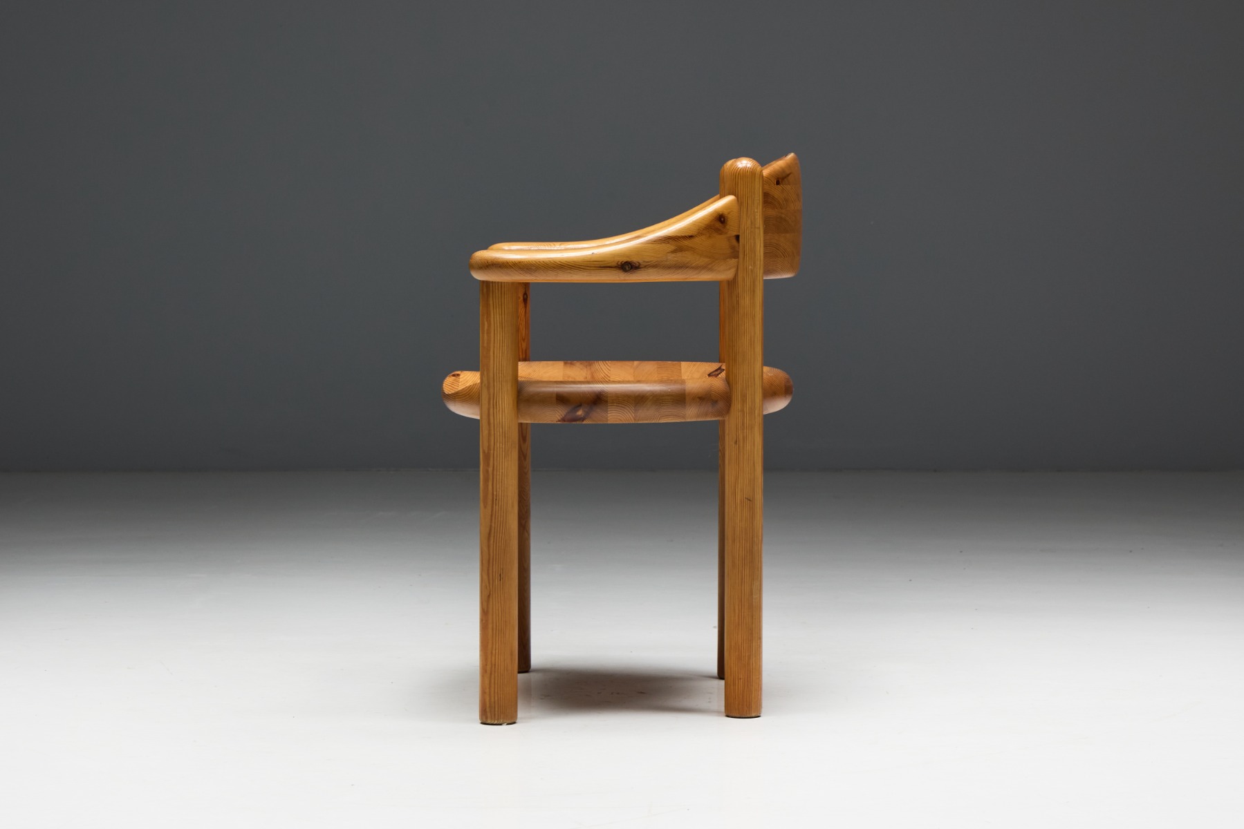 Architectural pine armchairs designed by Rainer Daumiller