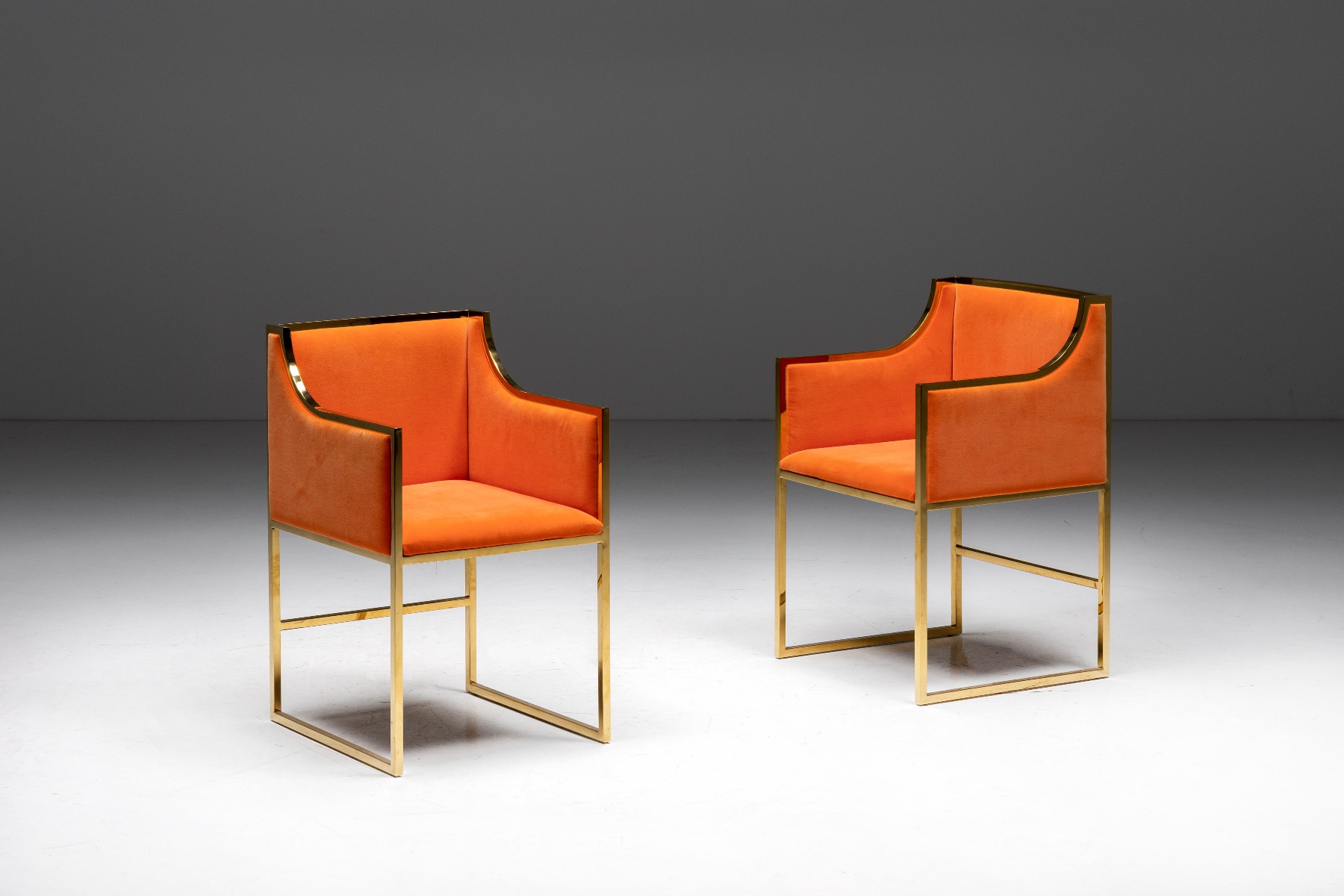 Retro glam brass framed dining armchairs