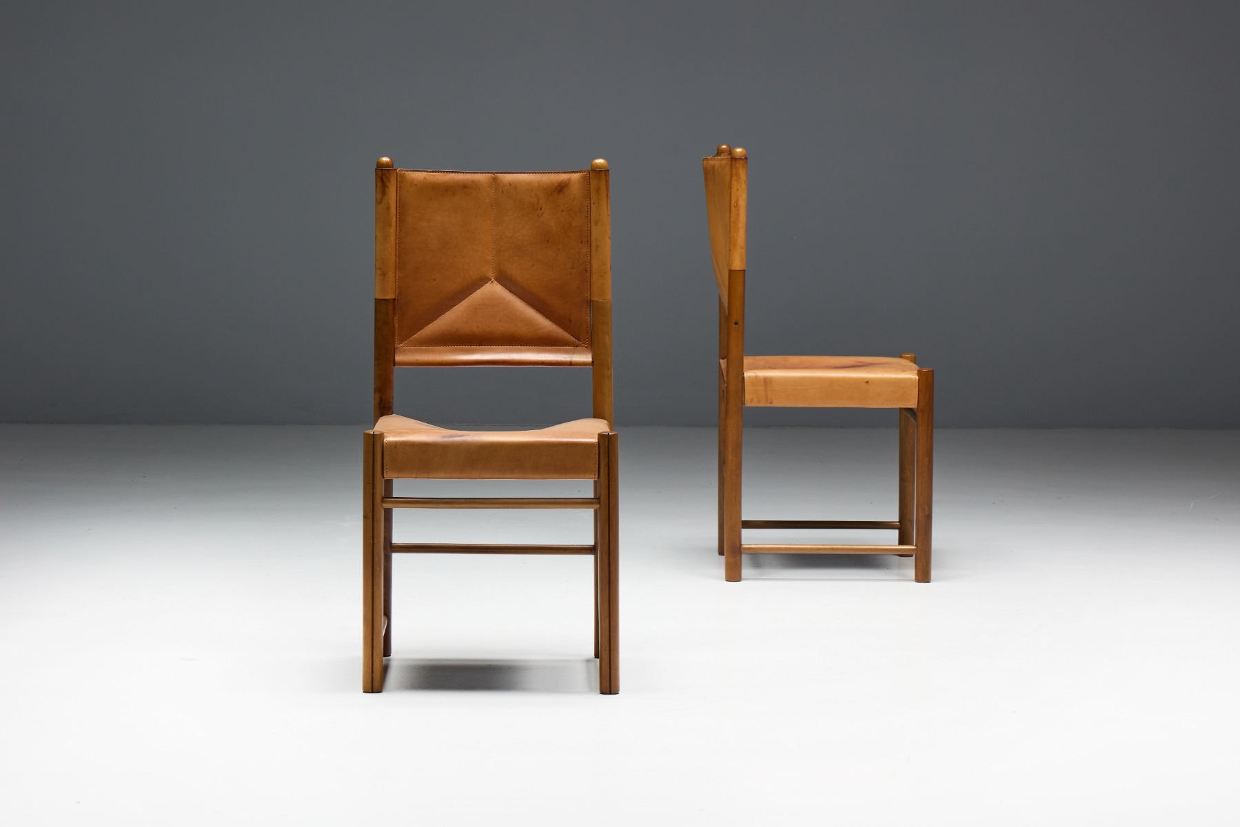 Heritage mid century leather upholstered chairs