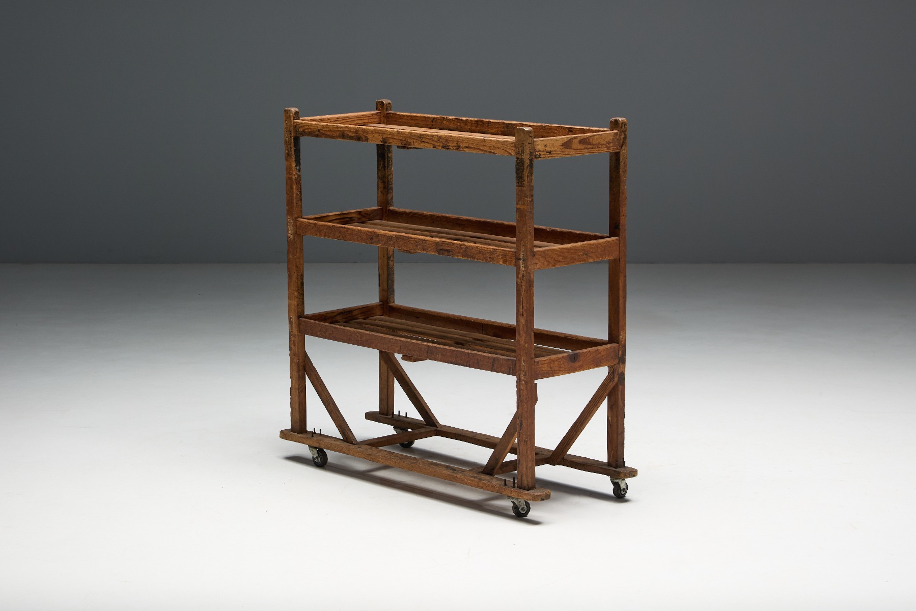 Patinated bakery rack with authentic folk art character