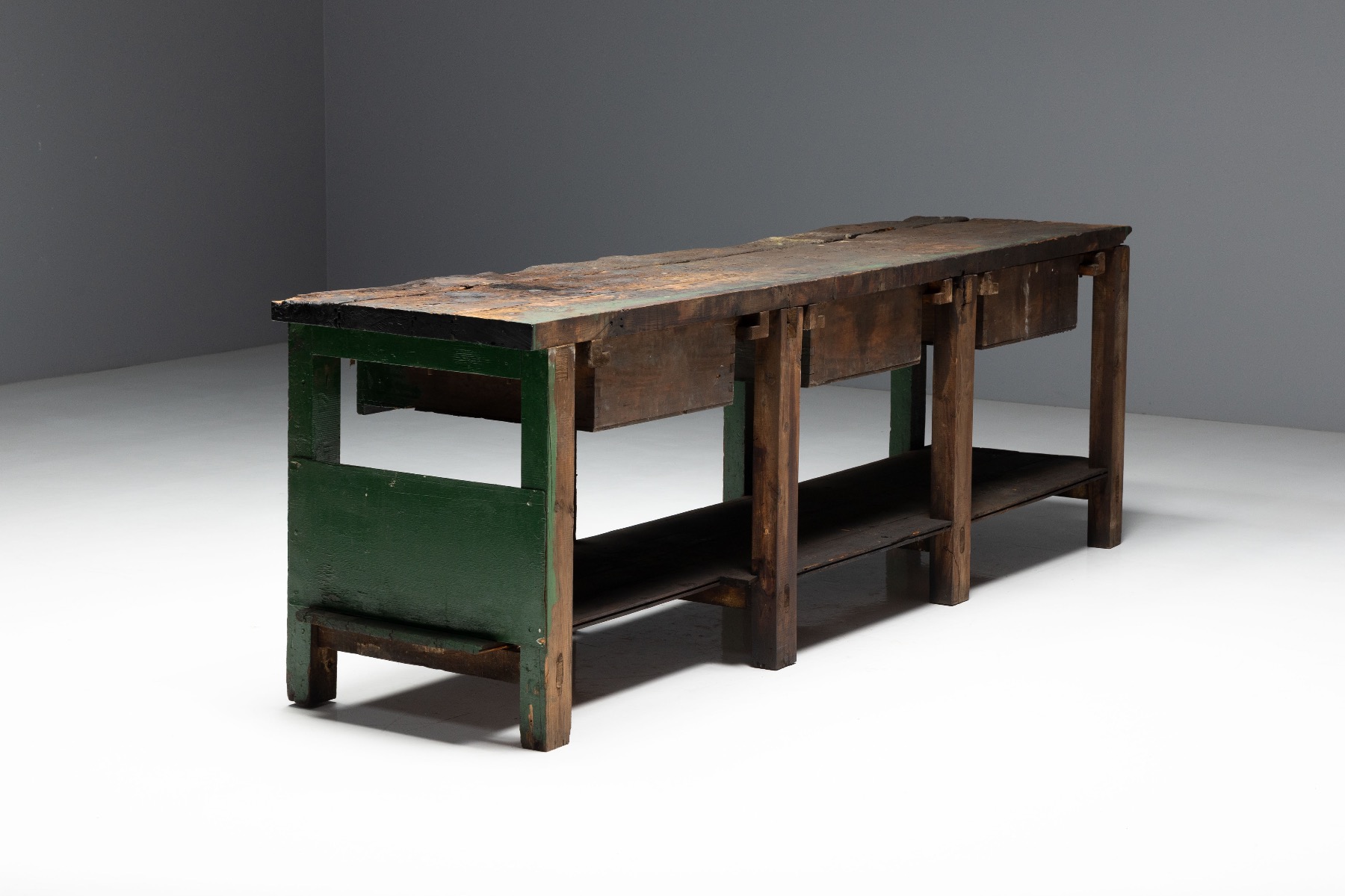 Rustic wooden industrial workbench with utilitarian appeal