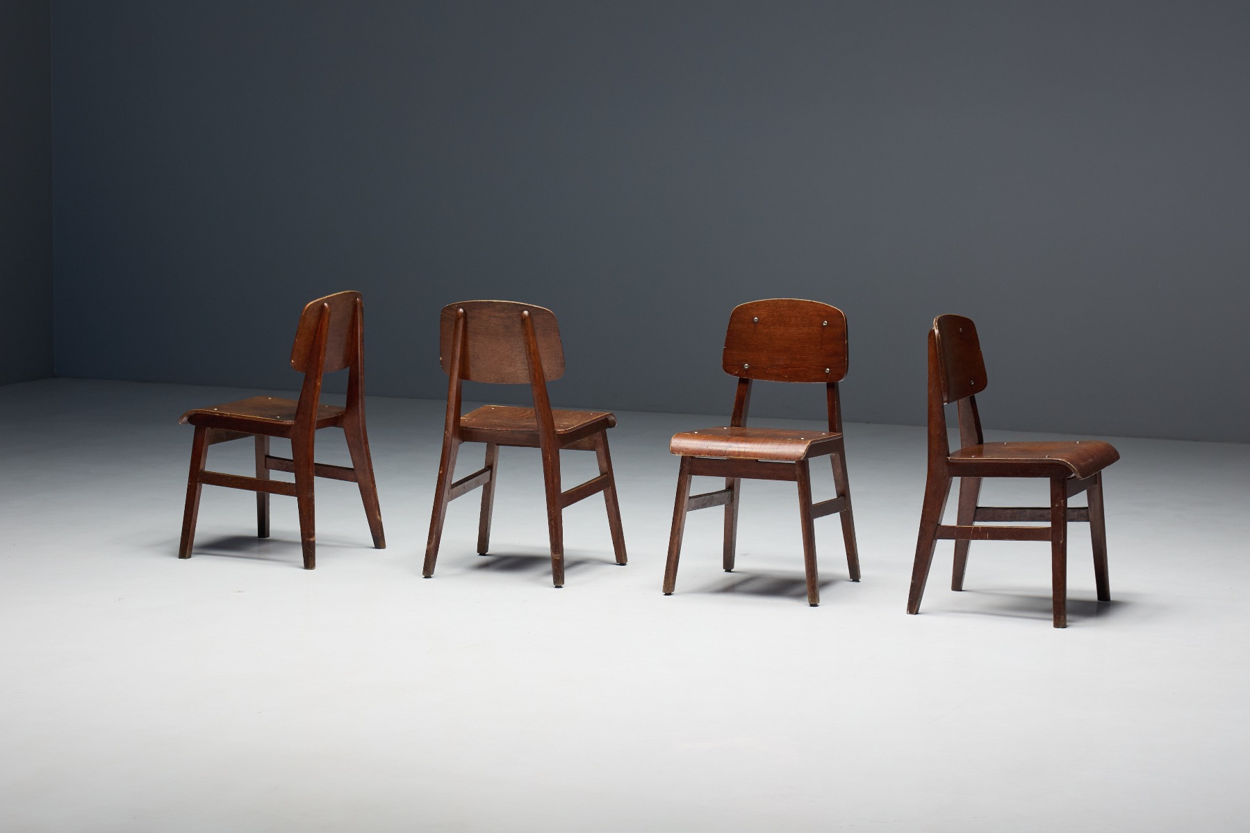 Sculptural solid wood chair with refined proportions