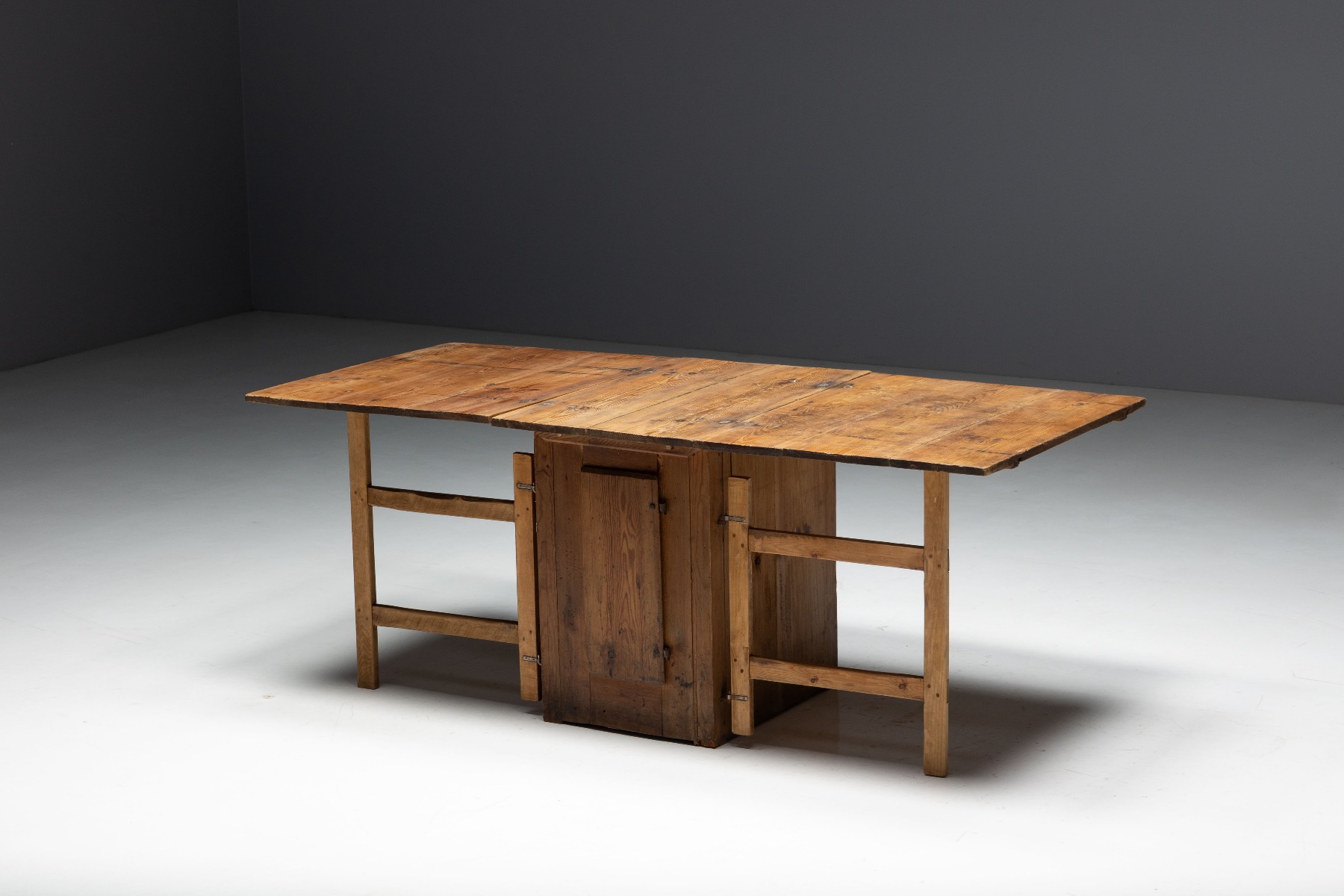 Traditional drop leaf worktable reflecting rural craft