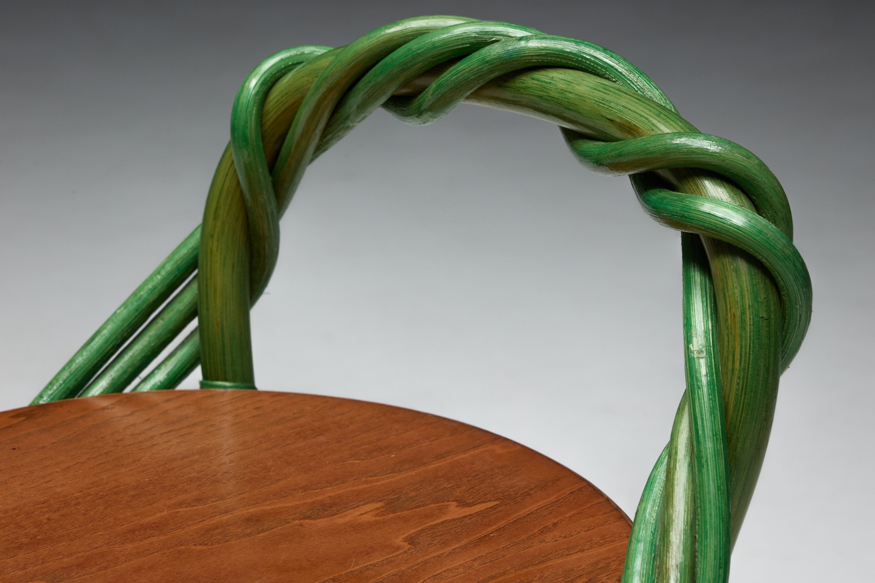 Whimsical sculptural stool with twisting vine shape