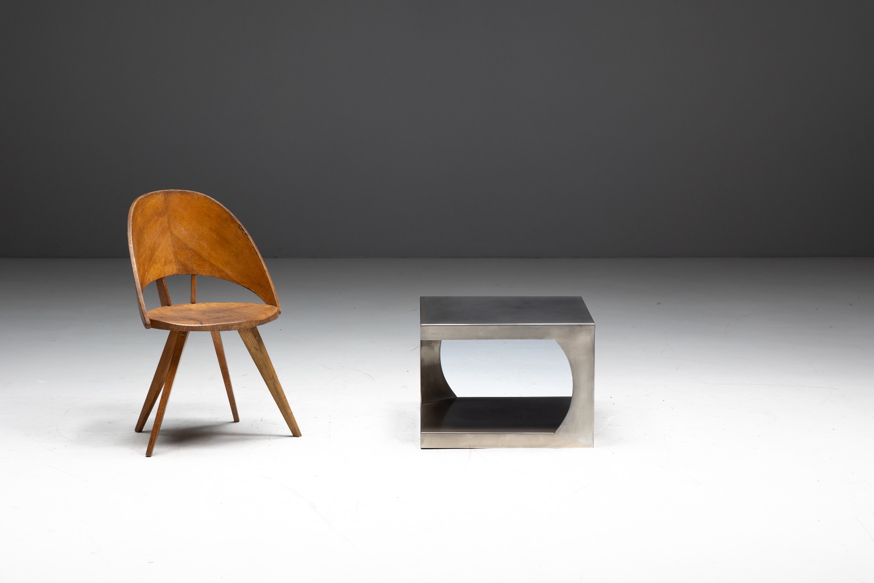 Aluminum modern side table reflecting 1970s design