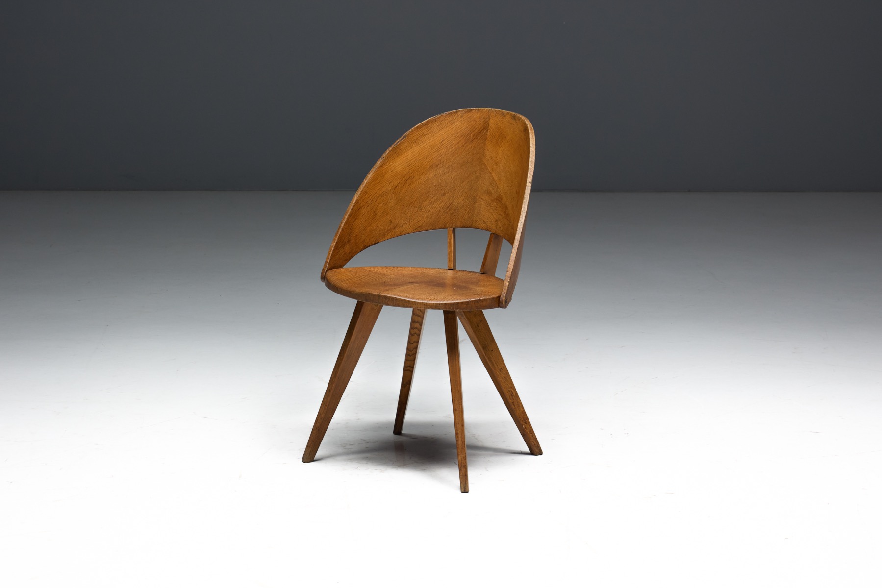 Functional Italian plywood dining chairs with minimalist character