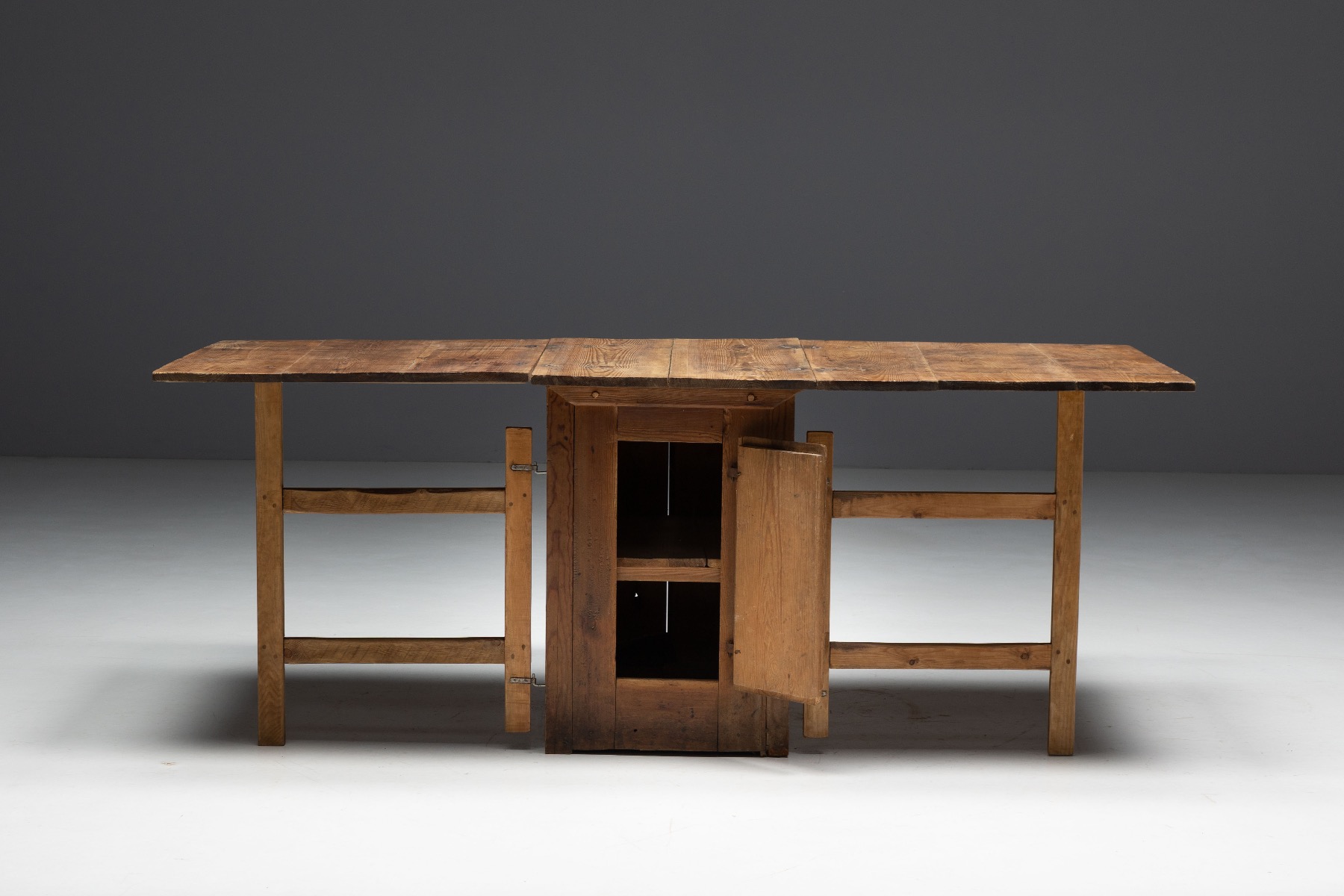 Handcrafted vernacular worktable with folding leaves