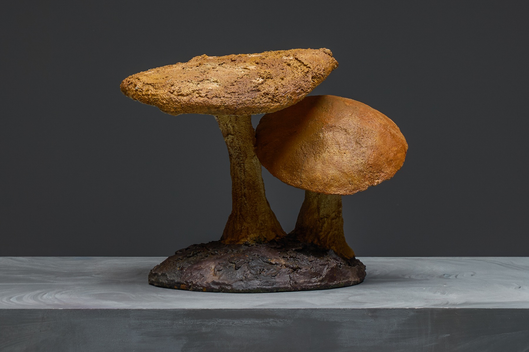 Hand formed mushroom sculpture with raw surface