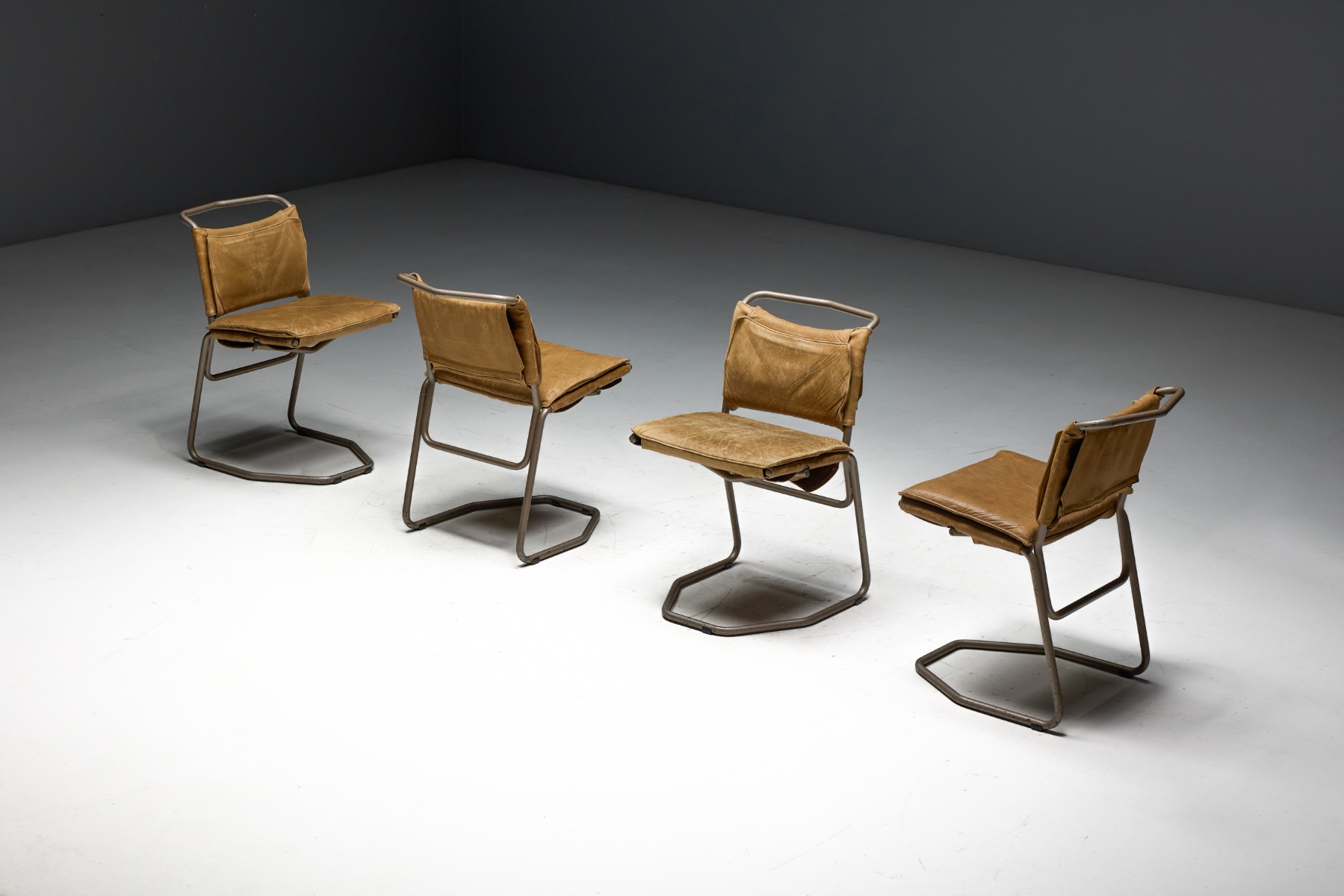 Refined modernist dining chairs by Raymond Rombouts