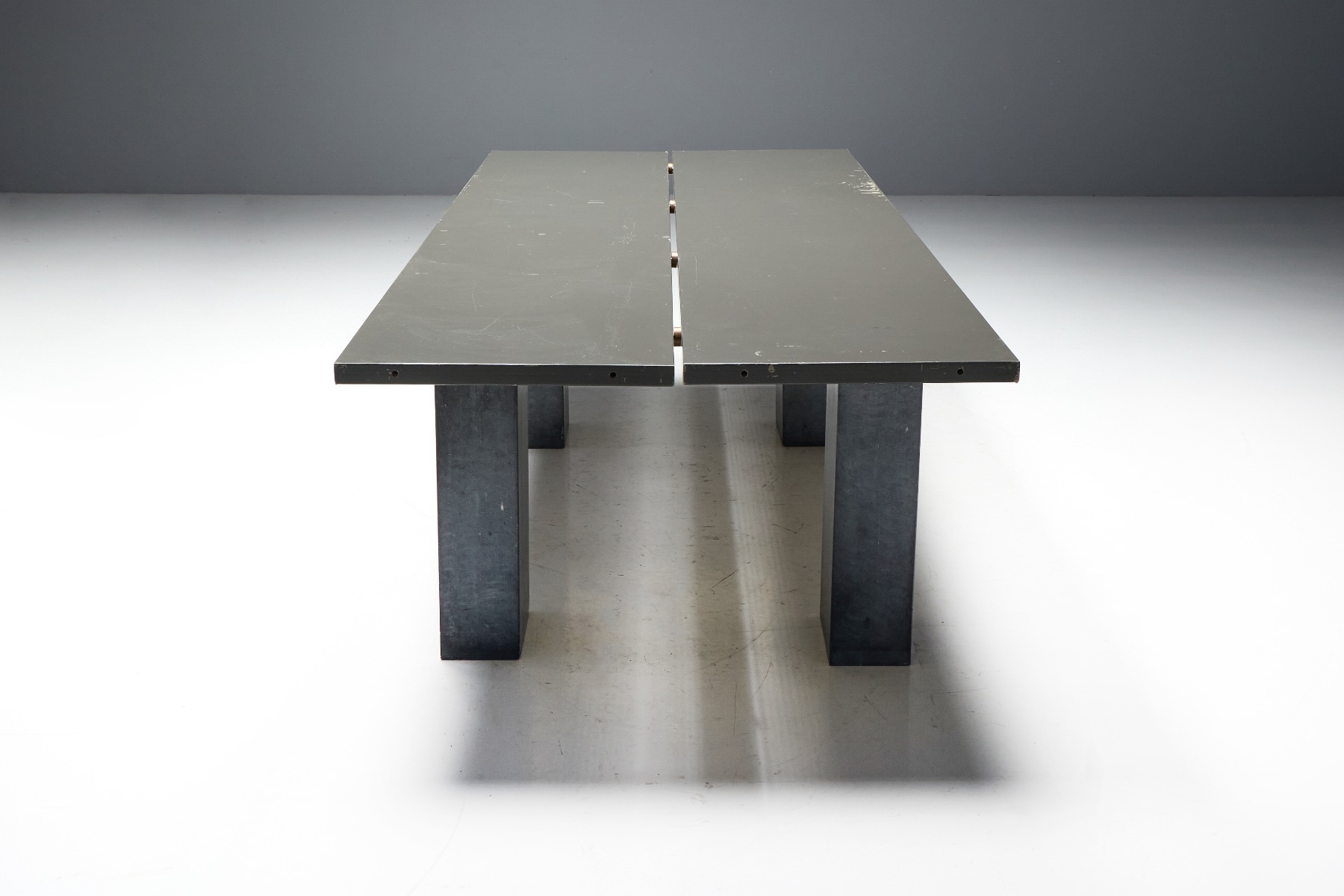 Rustic modern dining table on stone base