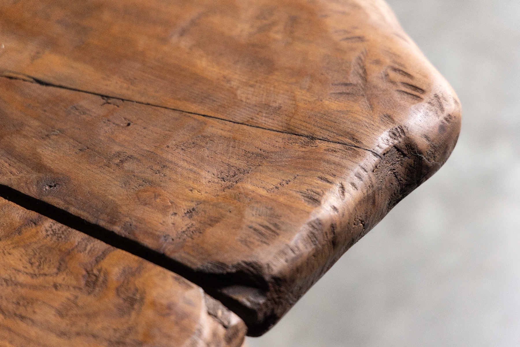 Sculpted solid wood table in organic style