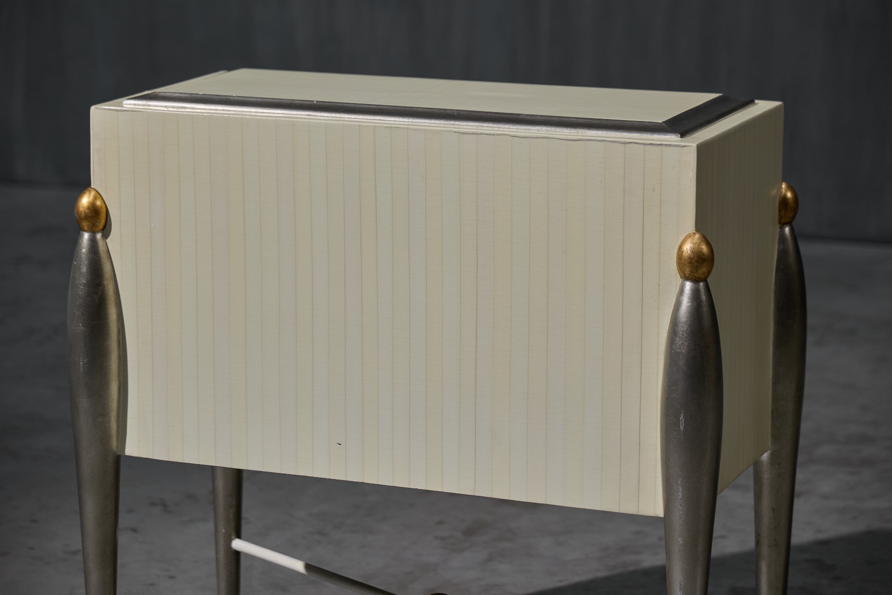 Refined Hollywood Regency drawer cabinet with elegant lines