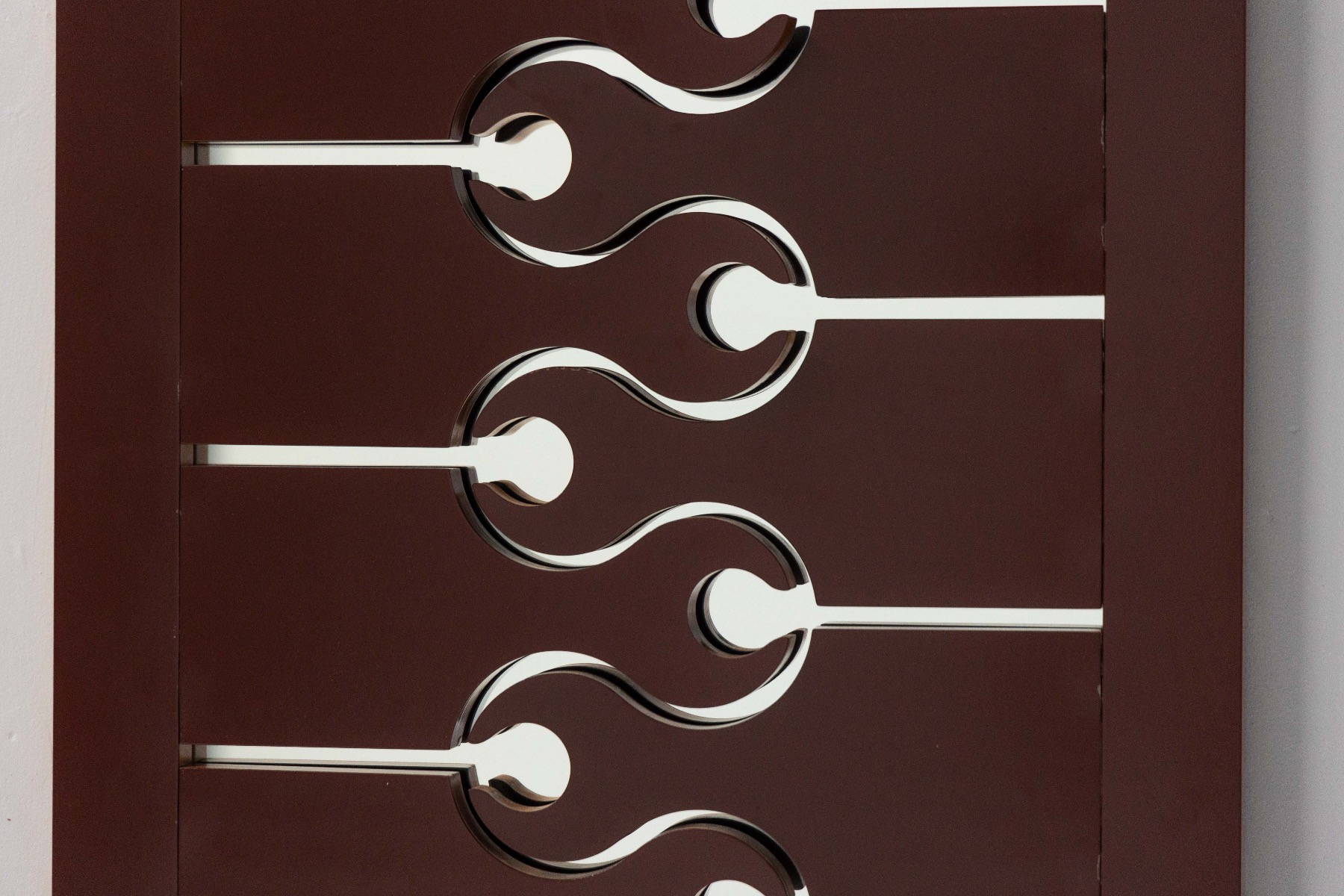Geometric modernist coat stand with strong presence