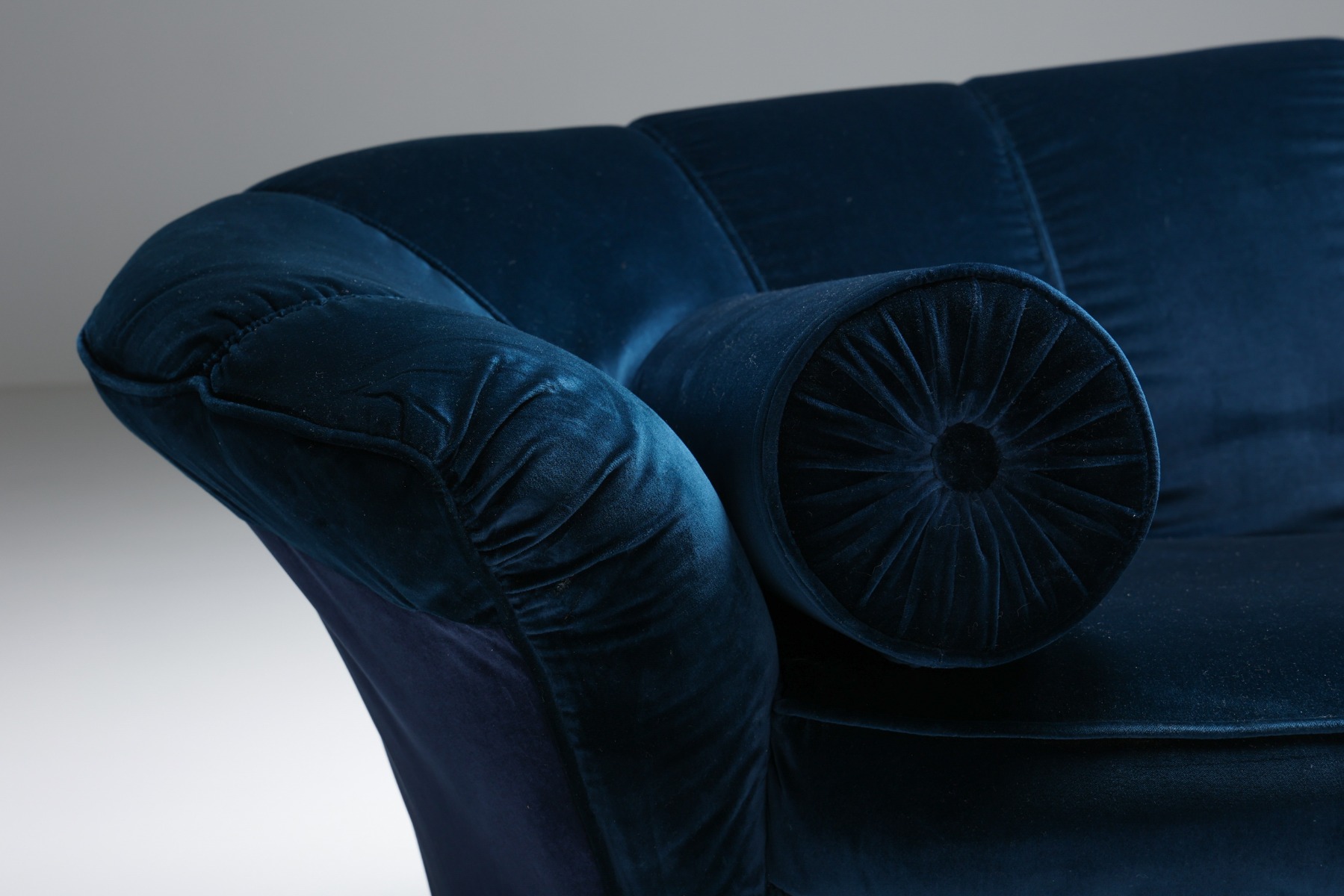 Gallery level Hollywood Regency curved velvet sofa
