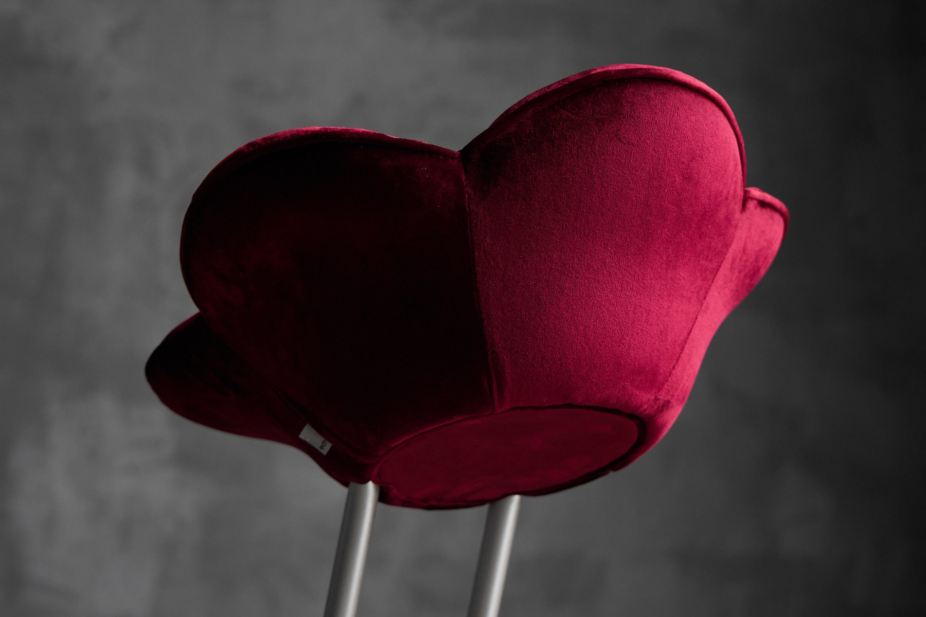 Vibrant floral stool with postmodern identity