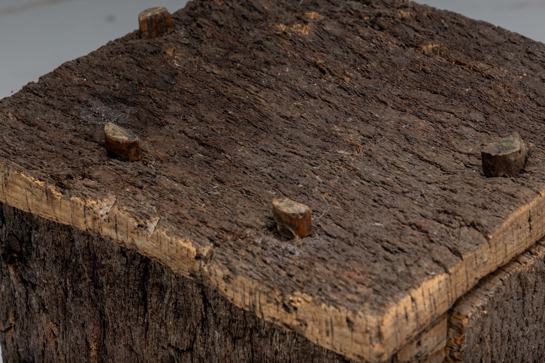 Primitive wooden beehives reflecting Wabi Sabi character
