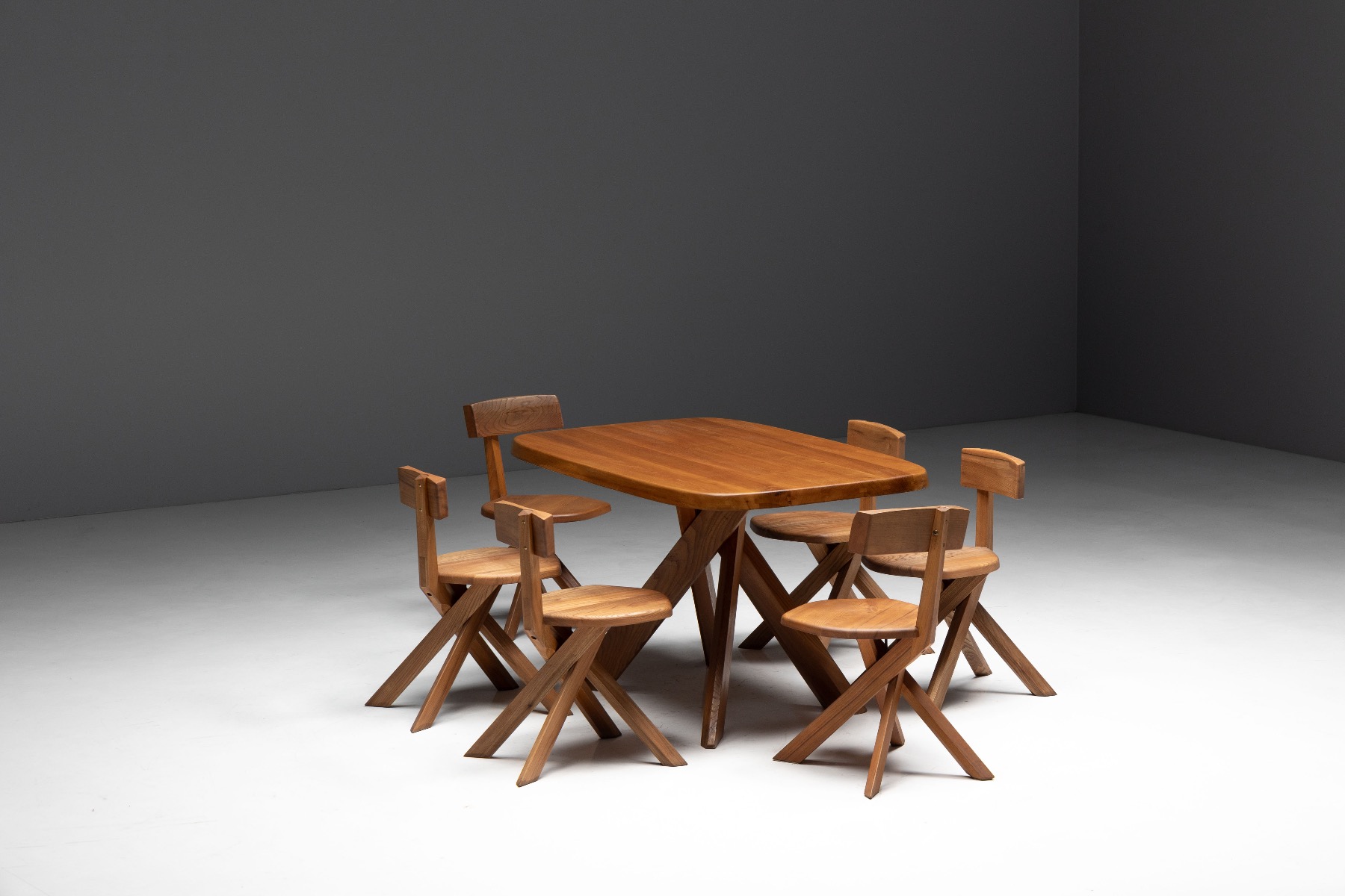 Refined modernist dining table with structural clarity