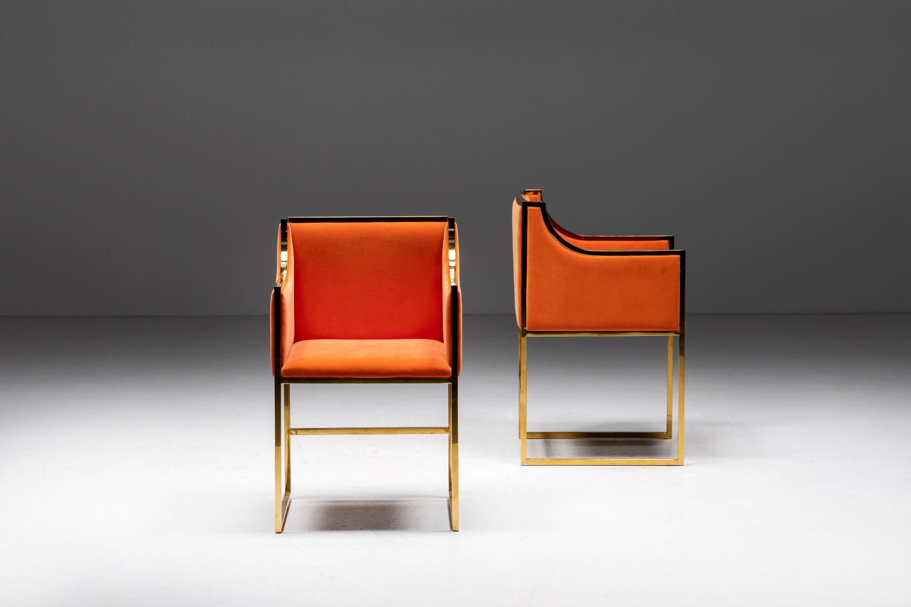 Refined 1980s dining armchairs with orange velvet