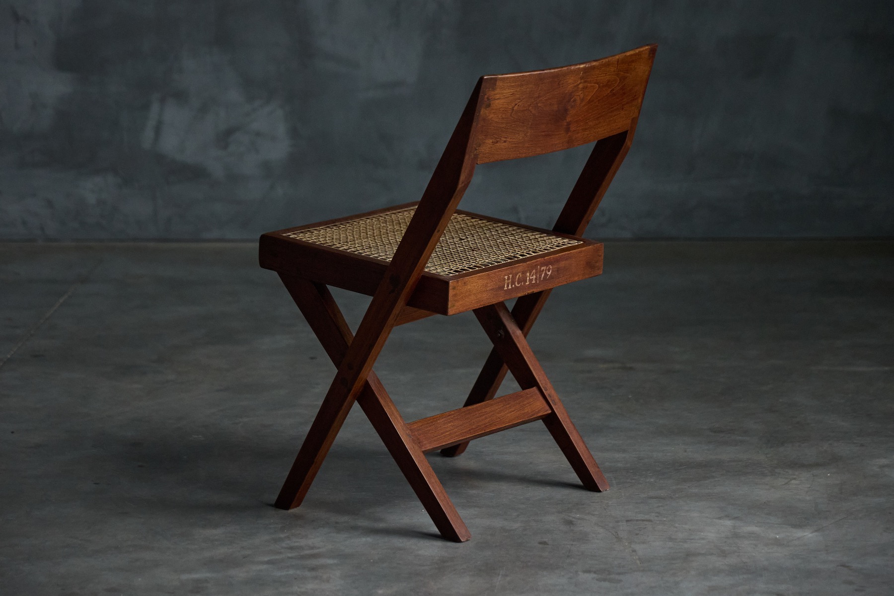Understated mid century library chair with clean geometry