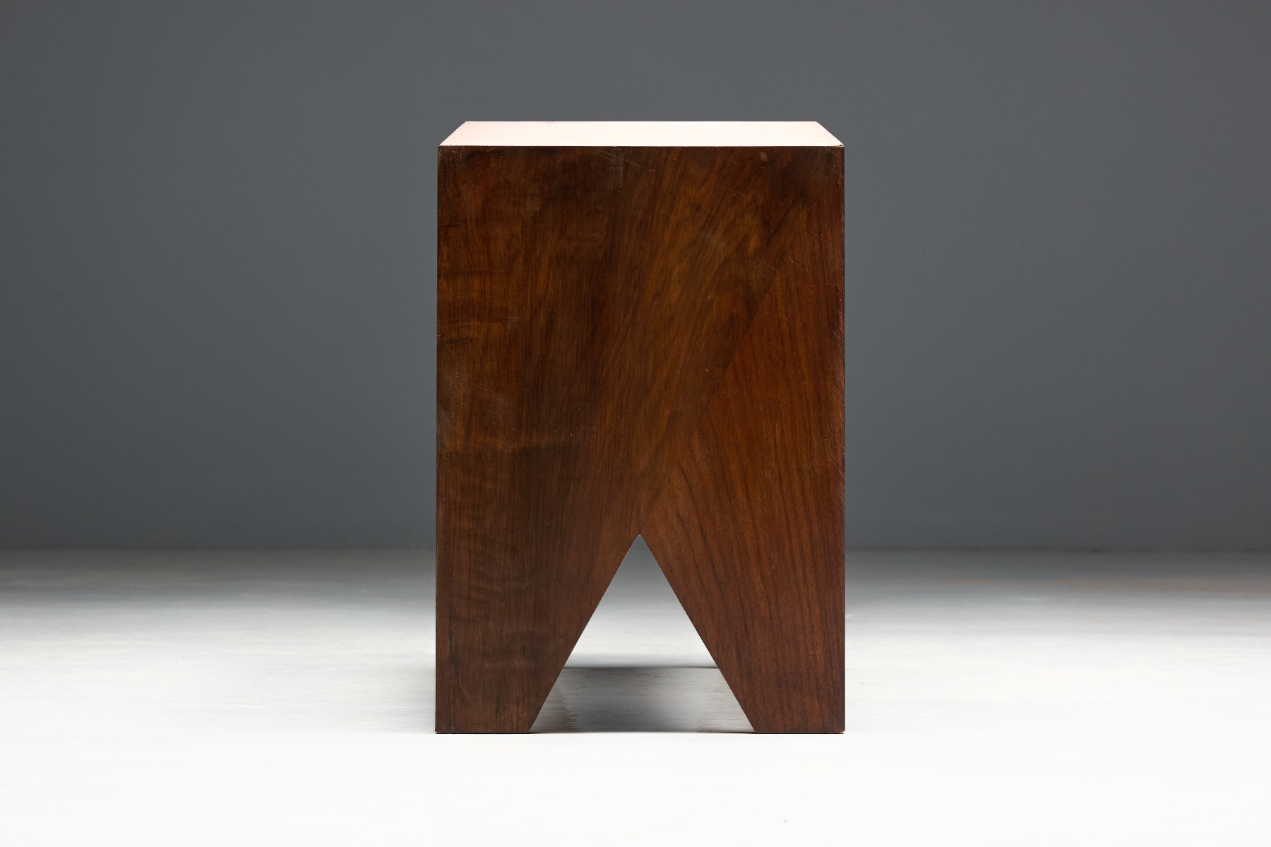 Understated walnut bench with minimalist aesthetic