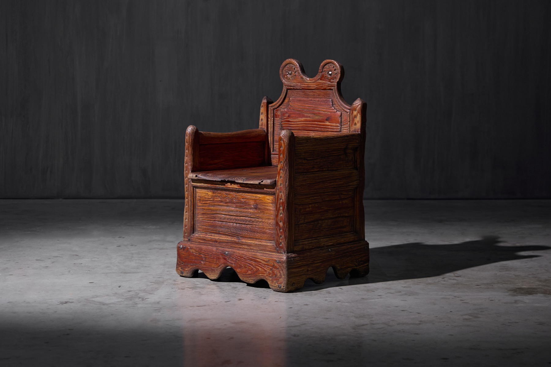 19th century armchair with inner storage compartment