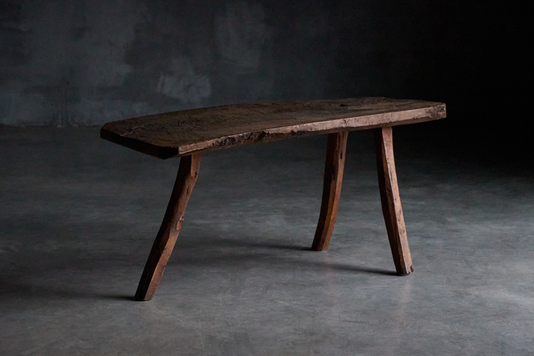 Brutalist tripod side table from the 19th century