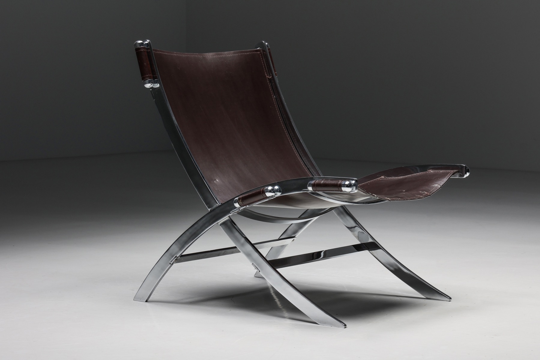 Burgundy leather scissor chair by Antonio Citterio for Flexform from the 1980s