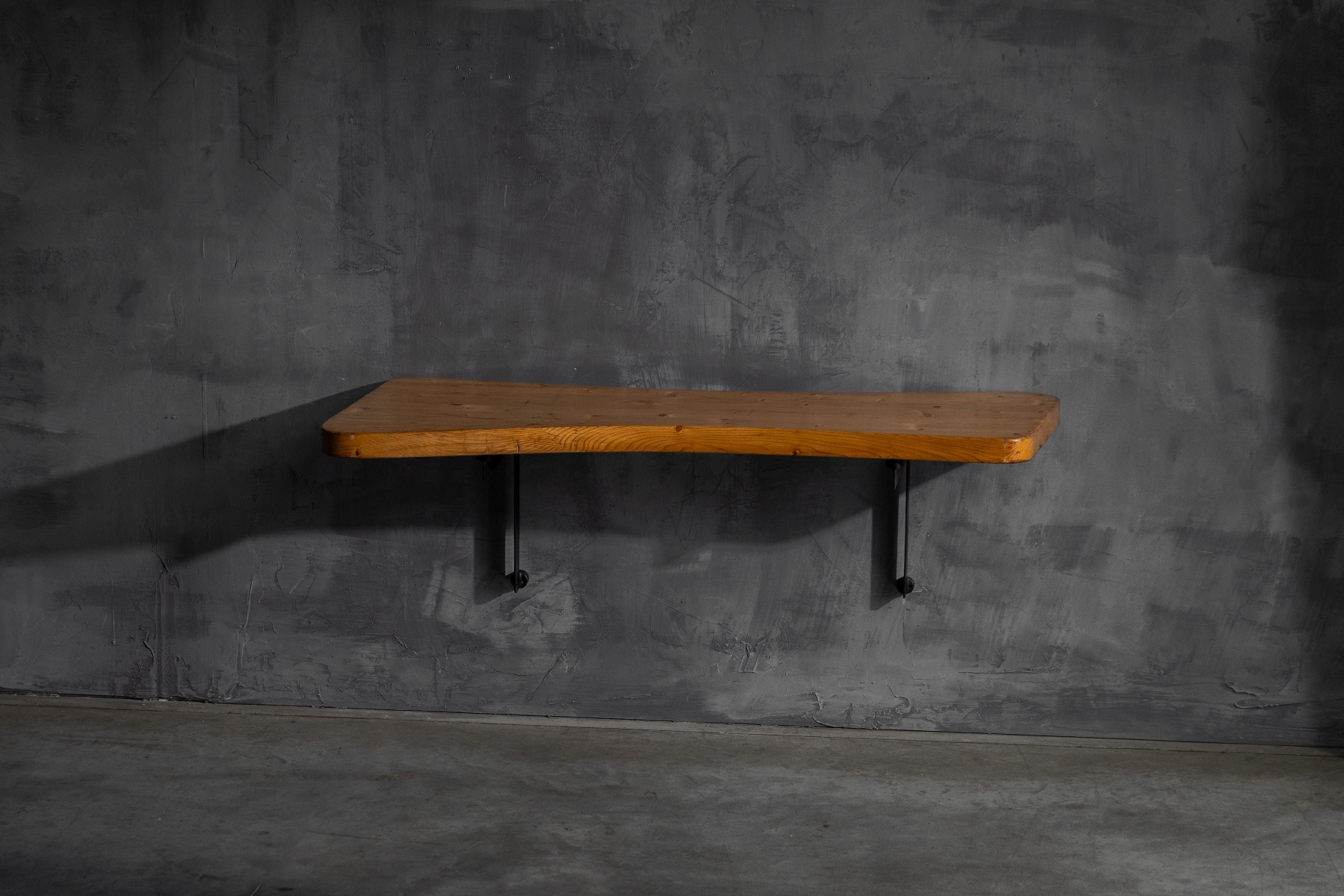 Console table designed by Charlotte Perriand in France in the 1950s with sculptural wooden top