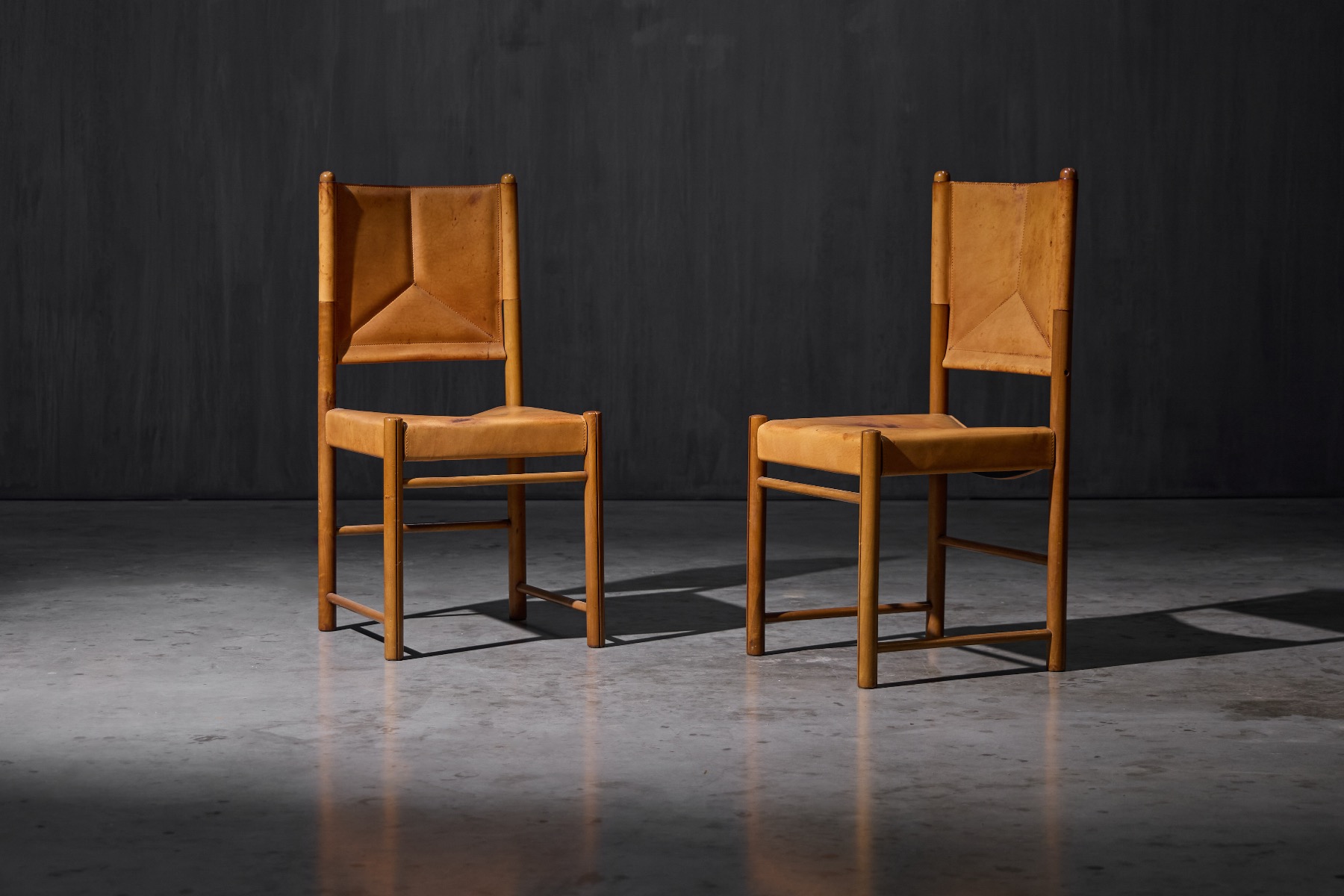 Cognac leather dining chairs from the 1960s