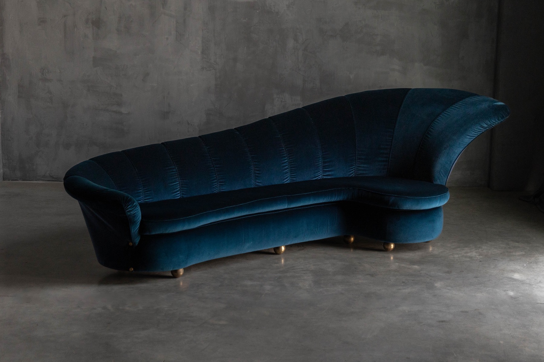 Curved velvet Hollywood Regency sofa from the 1970s