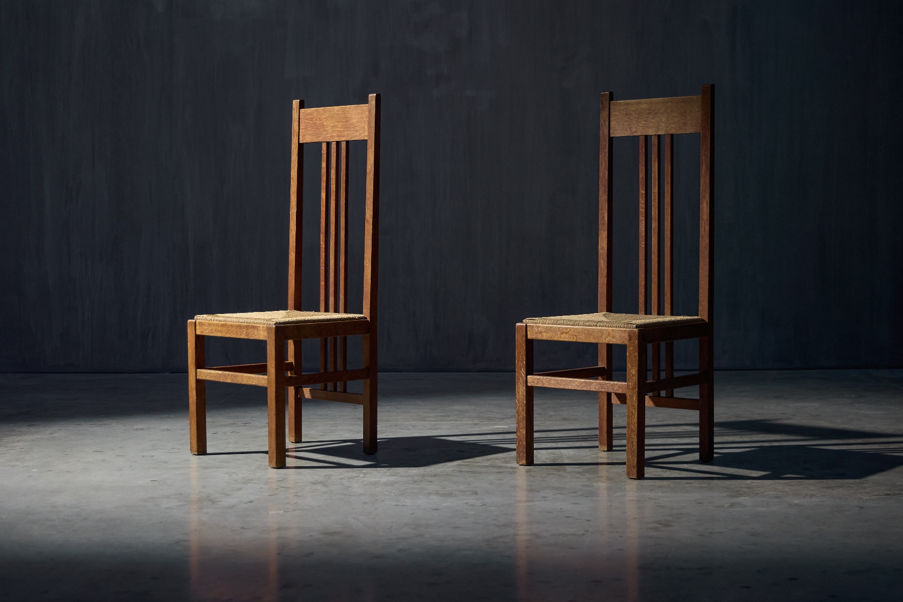 Dutch modernist high back chairs with cord seating from the 1920s