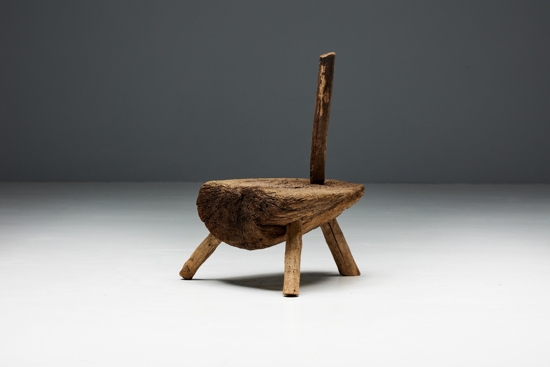 Folk art monoxylite tripod hearth chair from the nineteenth century