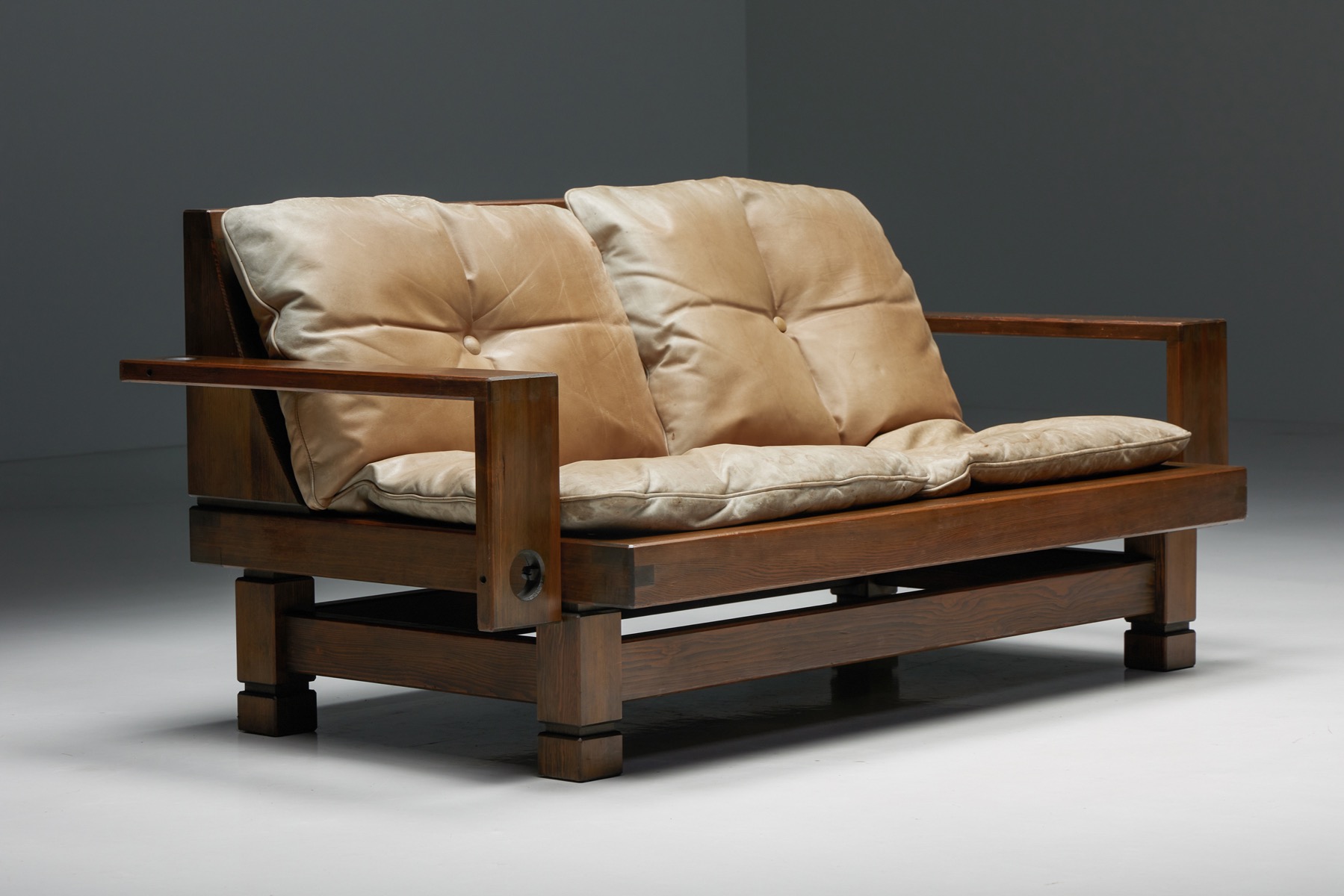 French wooden two seater with leather cushions from the 1960s