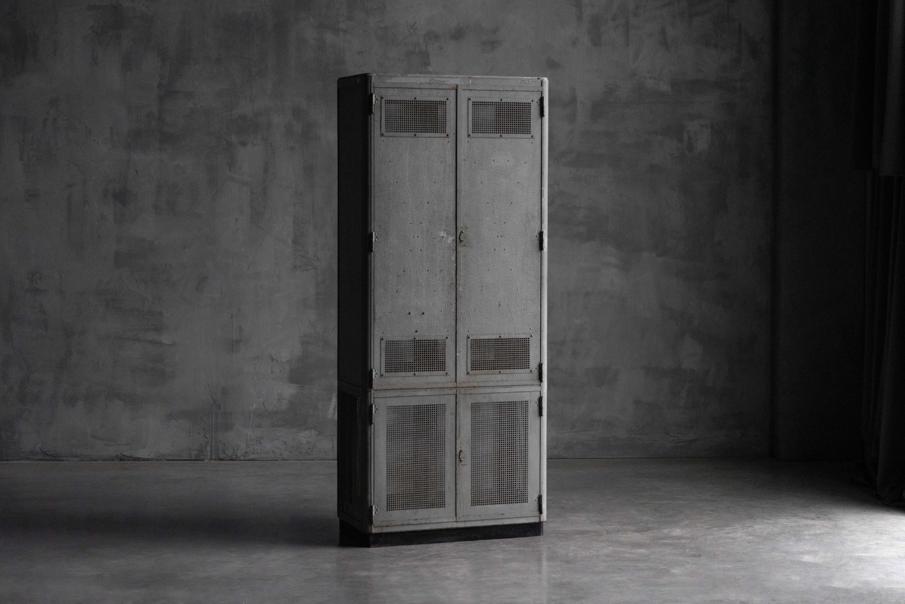 Industrial steel cabinet from the 1960s with utilitarian design