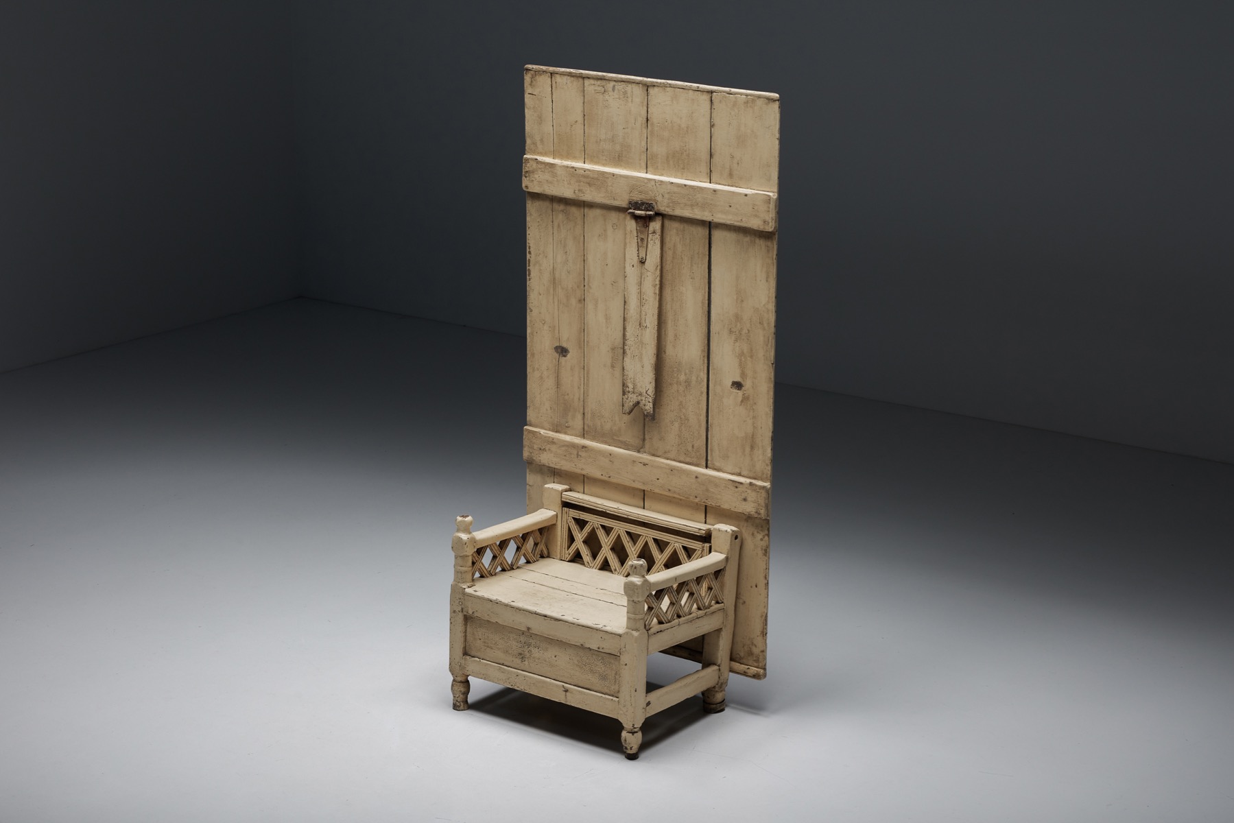 Irish wooden settle chair from the nineteenth century