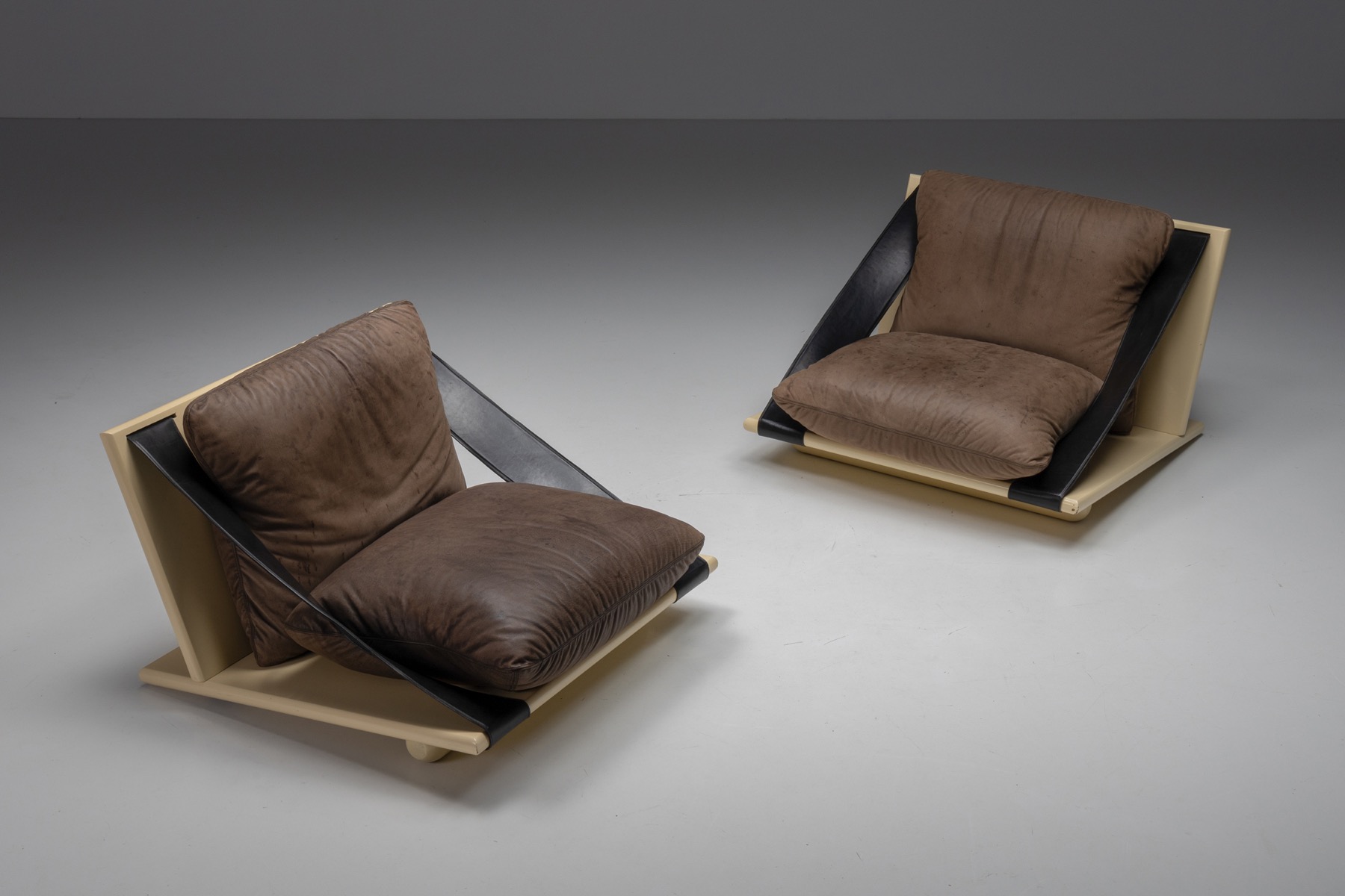 Lounge chairs in lacquer and leather from the 1970s