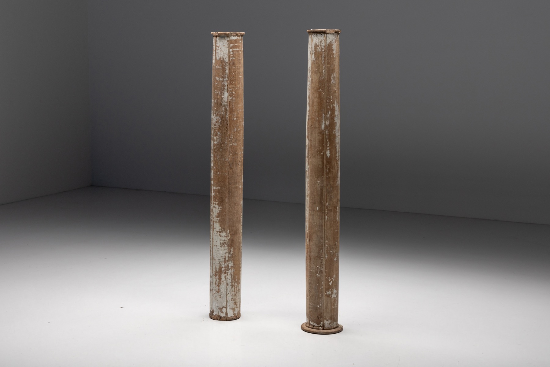 Partly patinated wooden columns from the nineteenth century