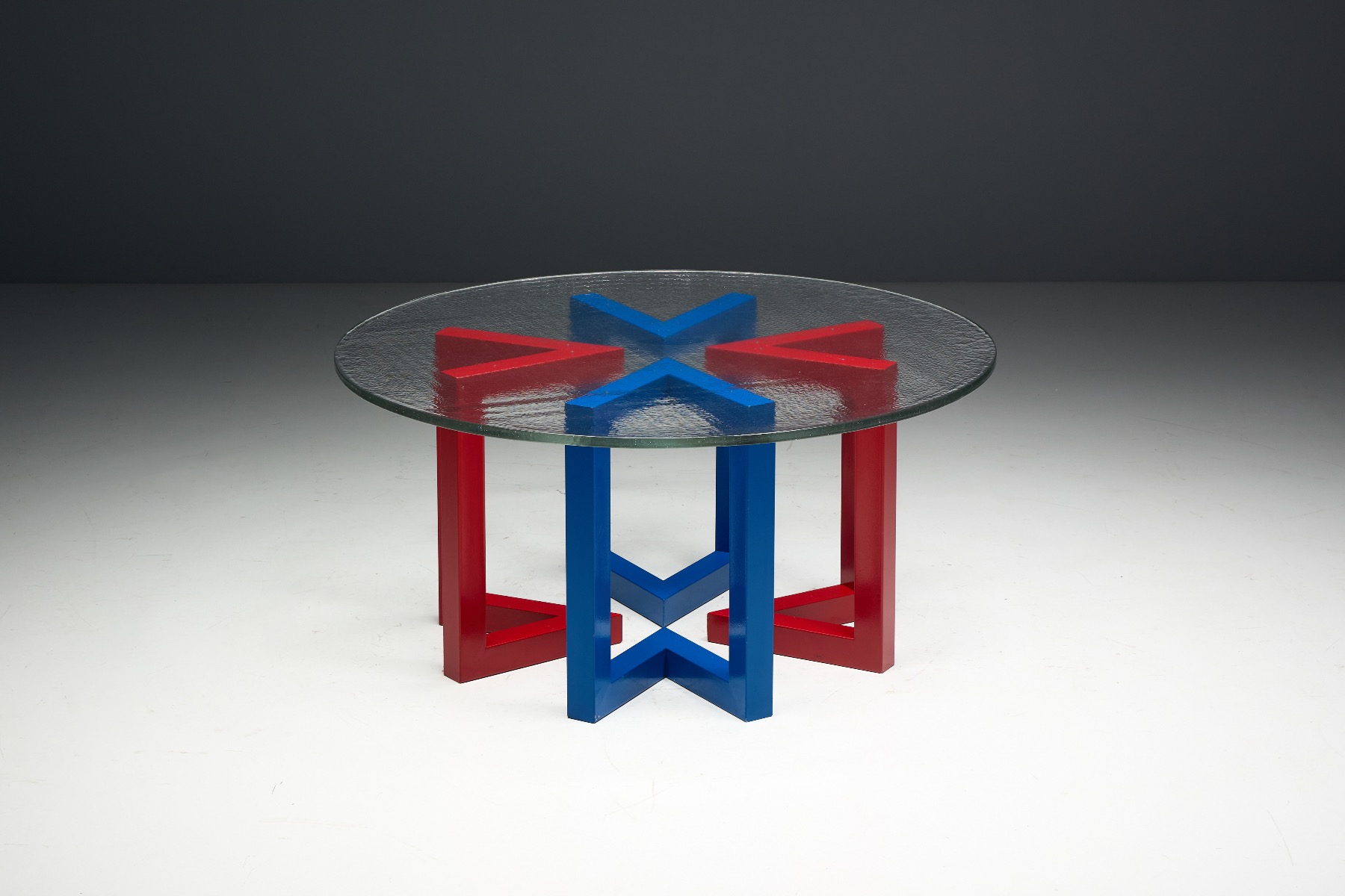 Postmodern dining table with hand blown glass top from the 1980s