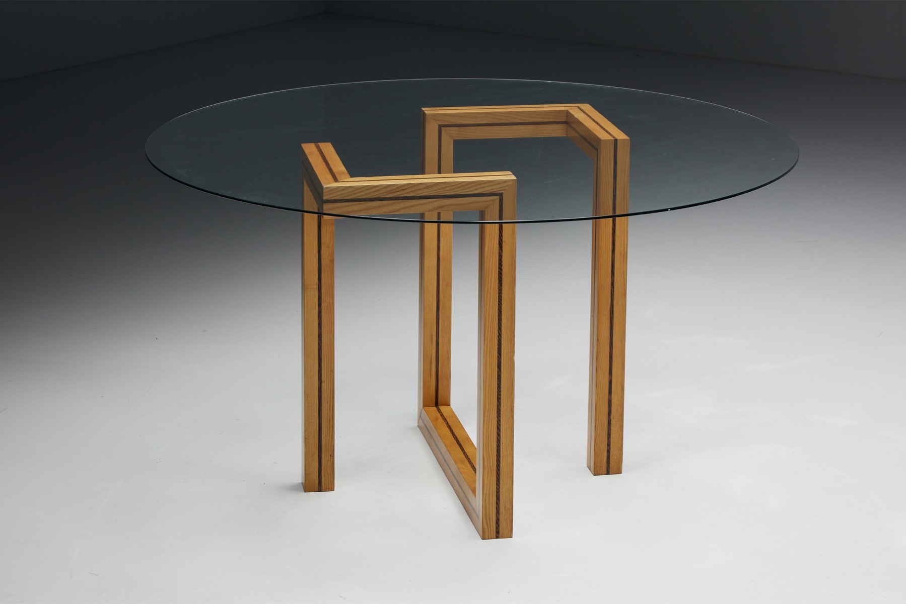Postmodern round glass dining table from the 1970s